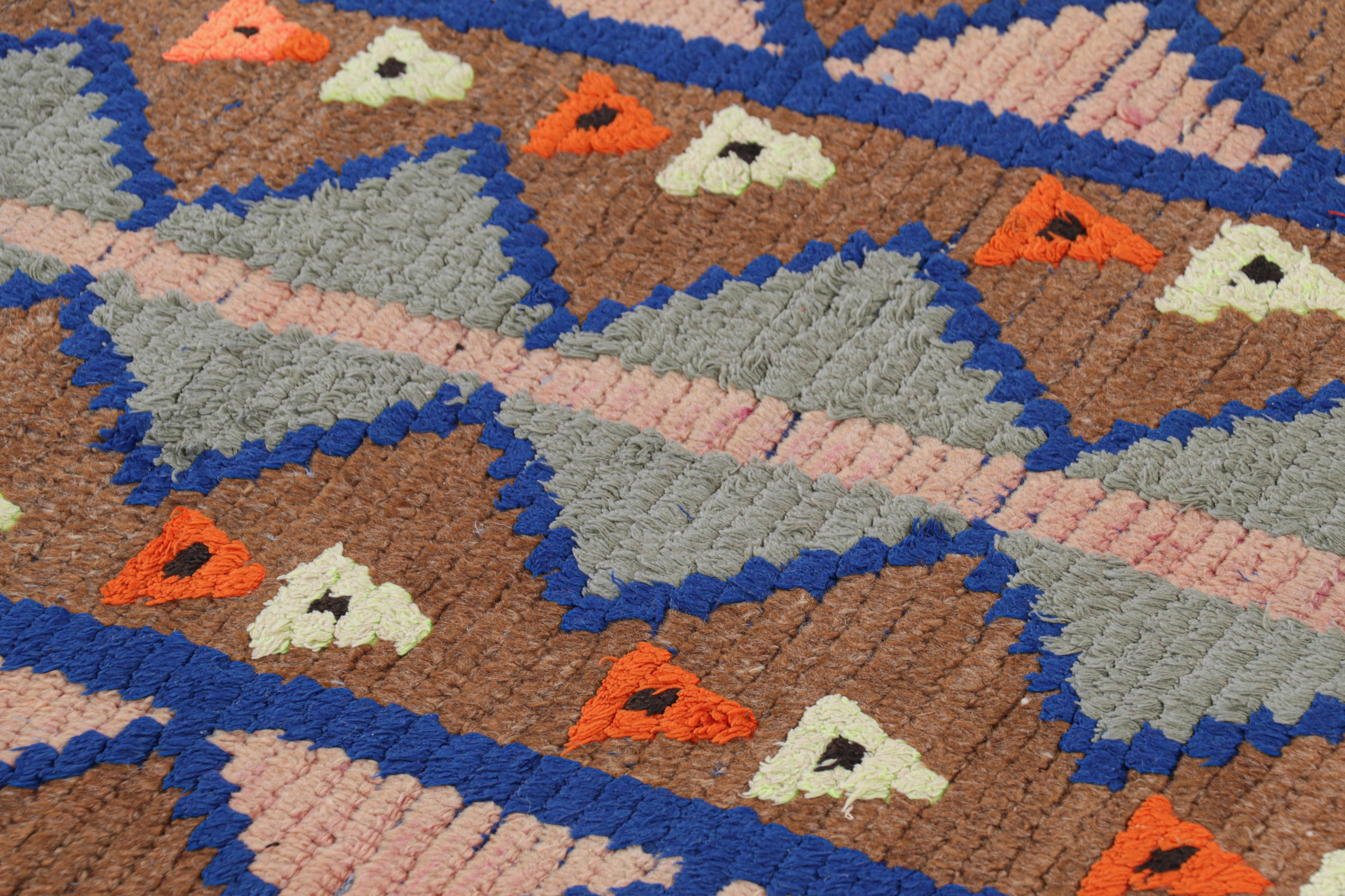 Hand-knotted in wool and originating from Morocco circa 1950-1960, this 2x8 vintage Moroccan rug is an extremely rare piece like so few of its provenance. 

On the Design: 

Admirers of the craft will note what an exceptional find this shabby chic