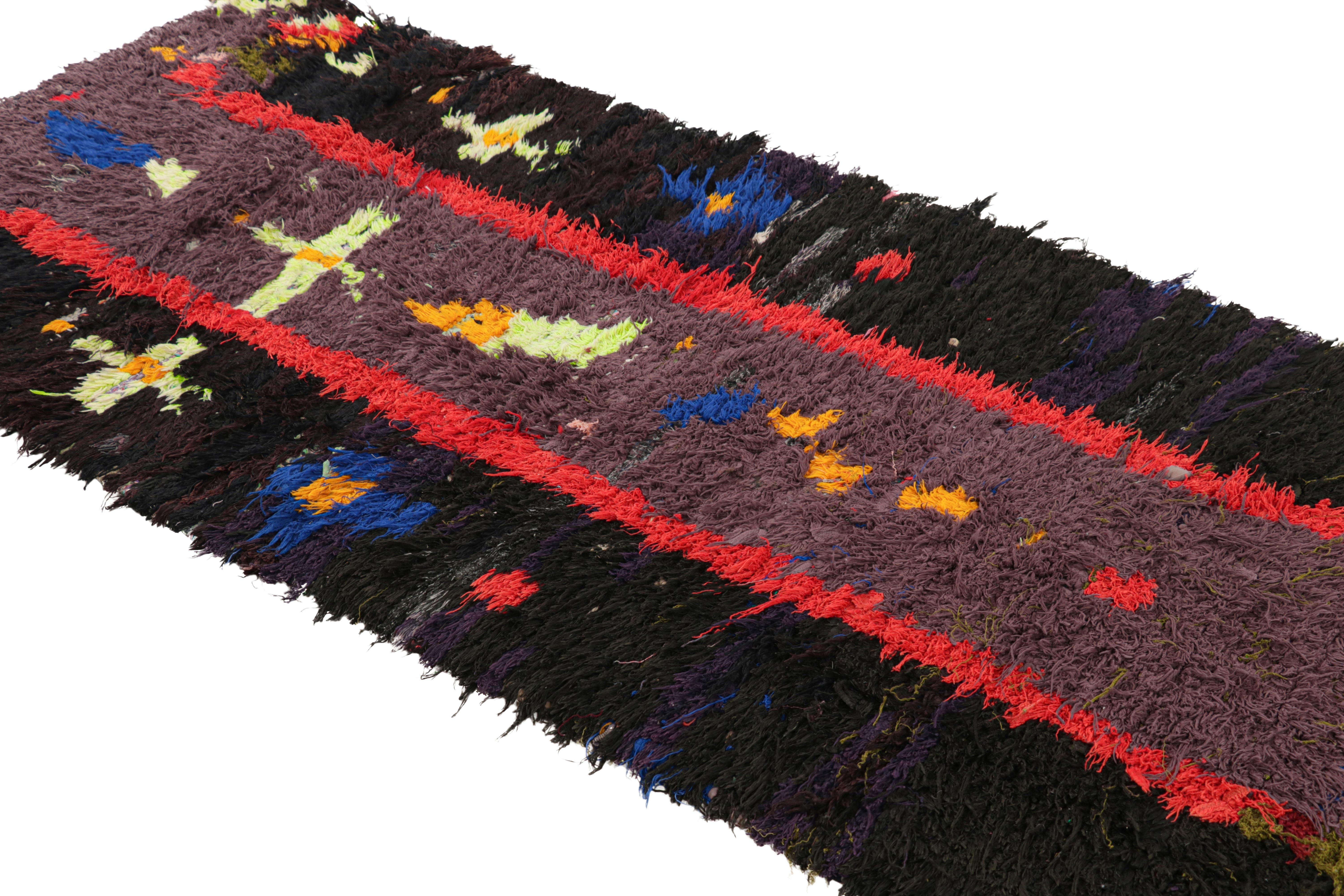 Hand-knotted in wool and originating from Morocco circa 1950-1960, this 3x8 vintage Moroccan rug is an extremely rare piece like so few of its provenance. 

On the Design: 

Admirers of the craft will note what an exceptional find this shabby chic