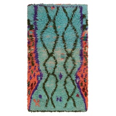 Alfombra marroquí vintage con motivos geométricos policromados, de Rug & Kilim