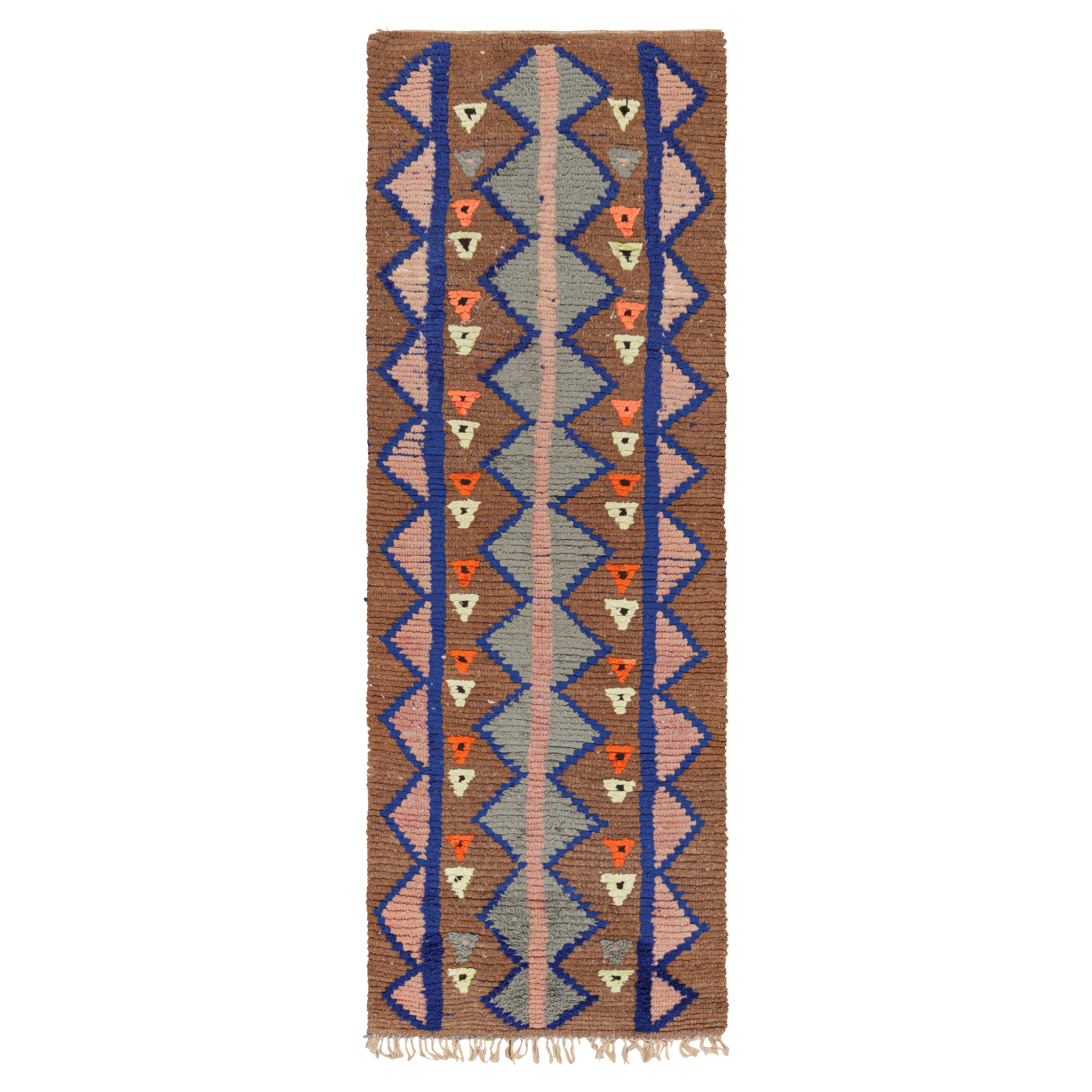 Alfombra marroquí vintage con motivos geométricos policromados, de Rug & Kilim