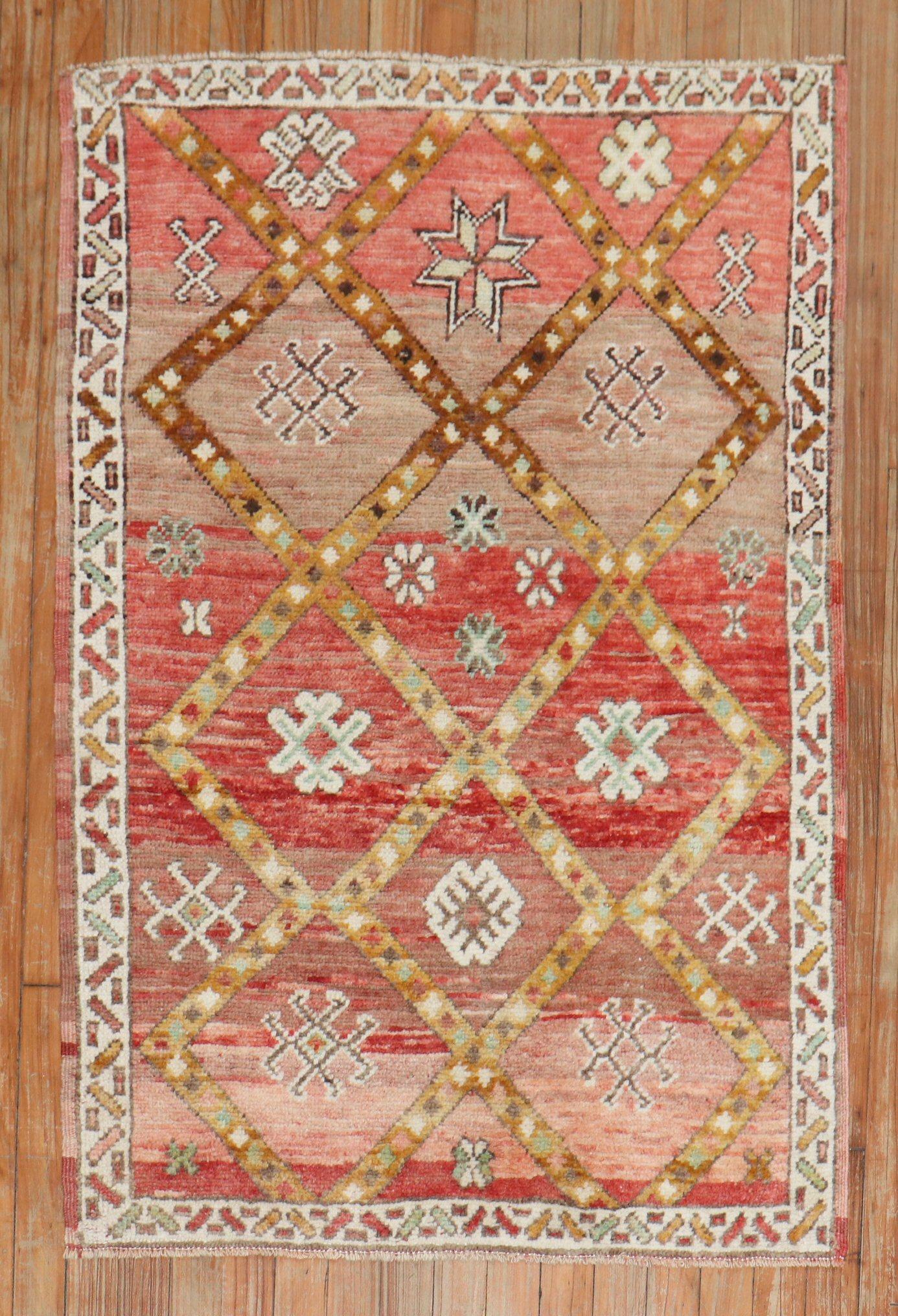 An early 20th century Moroccan Scatter size rug

Measures: 2'10'' x 4'2''.
