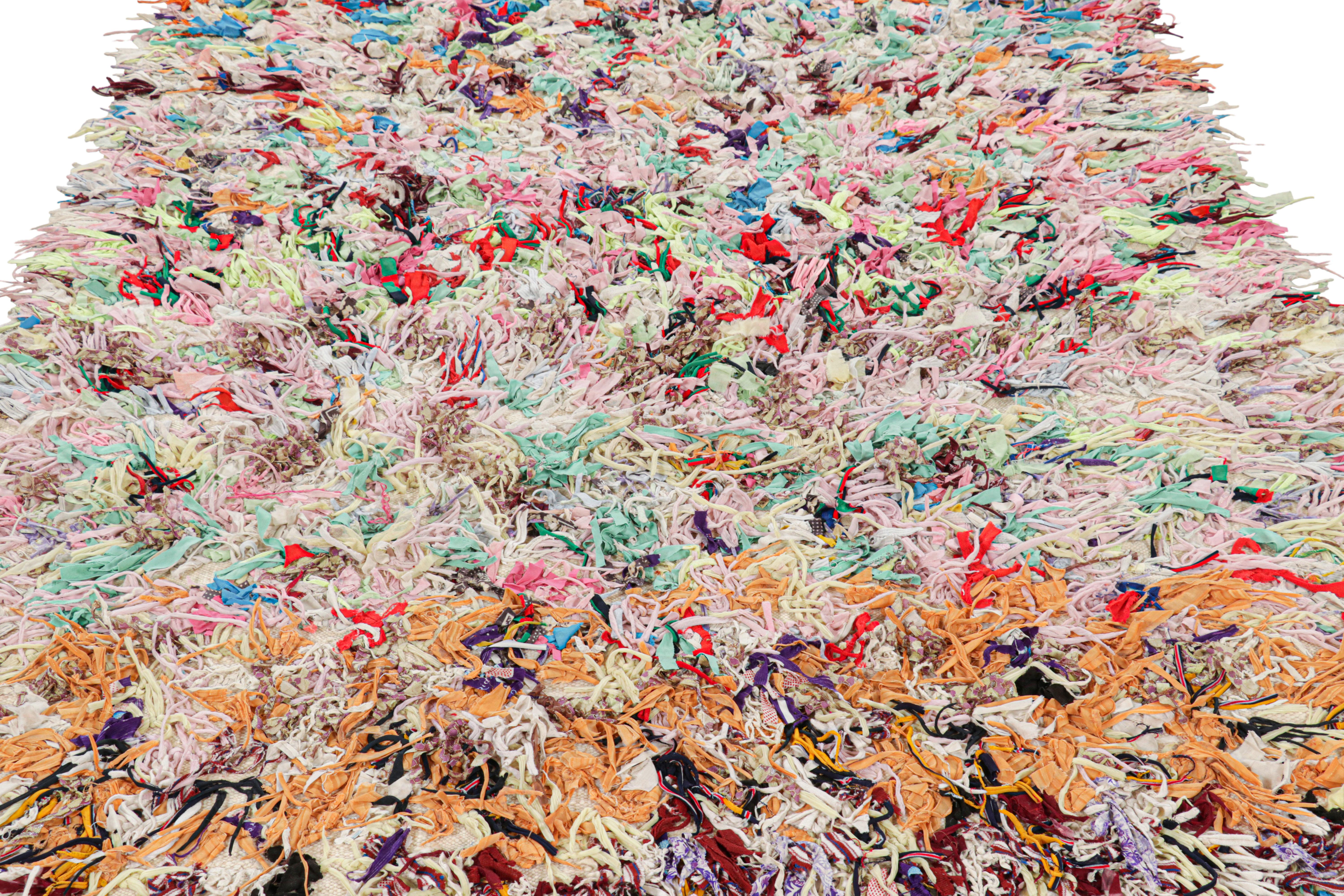 Hand-knotted in wool and originating from Morocco circa 1950-1960, this 6x10 special vintage rug features a colorful boho chic primitivist design. 

On the Design: 

Admirers of the craft will note that the colors have aged beautifully for a work of