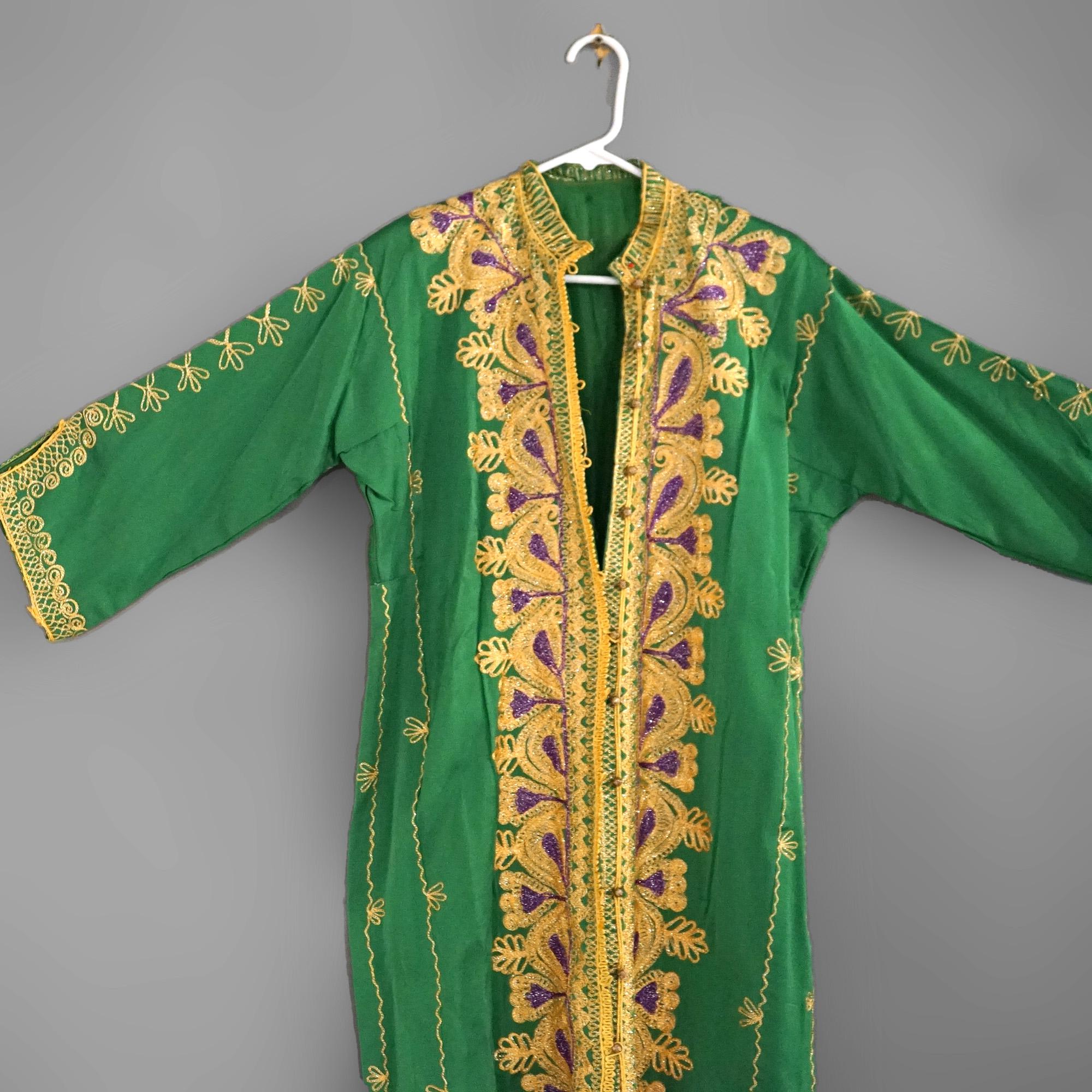 Vintage Moroccan Silk & Gold Metallic Needlework Robe 20th C

Measures- 58''H x 17.5''W x 2''D; 17.5'' Across the shoulders