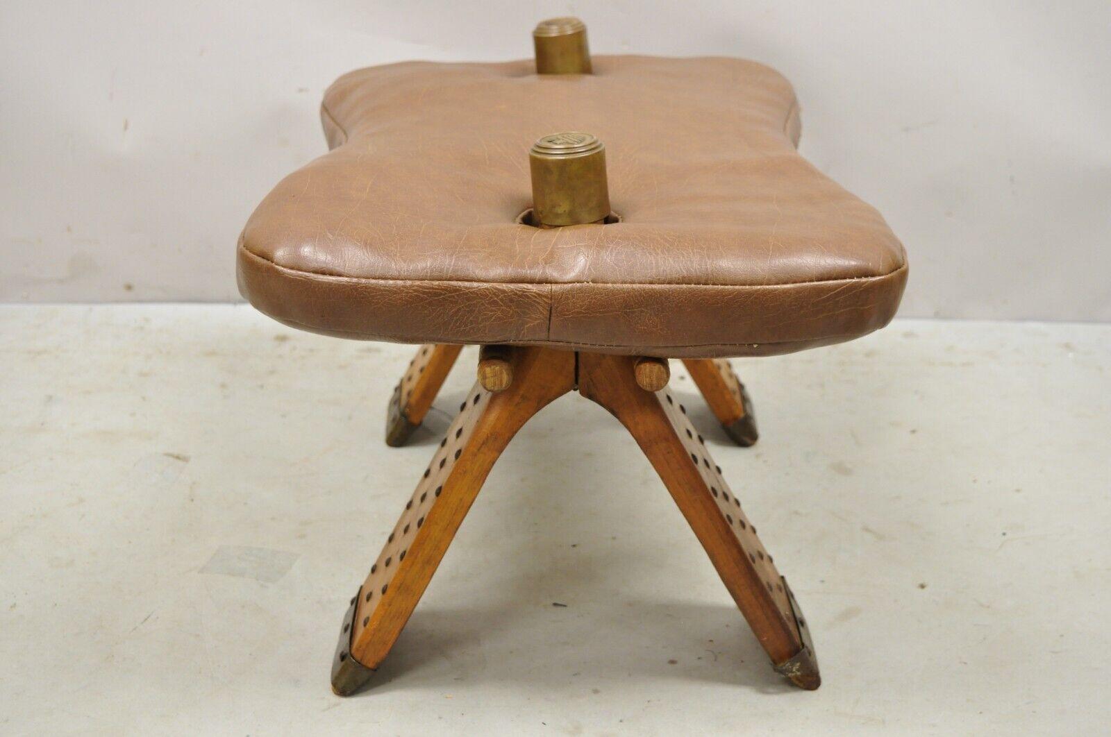 20th Century Vintage Moroccan Style Brown Vinyl Wooden Camel Saddle Ottoman Stool For Sale