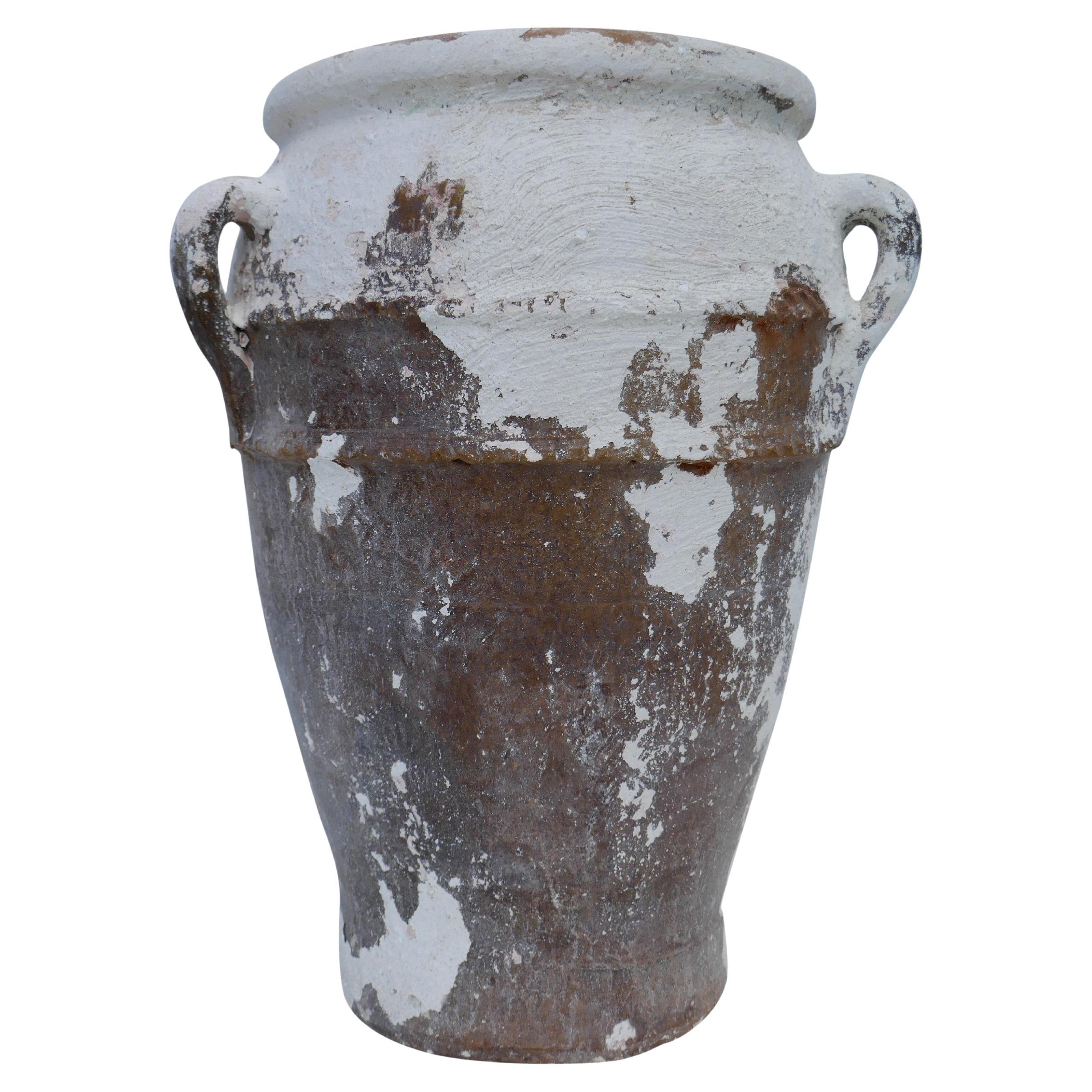 Vieux vase à eau marocain en terre cuite
