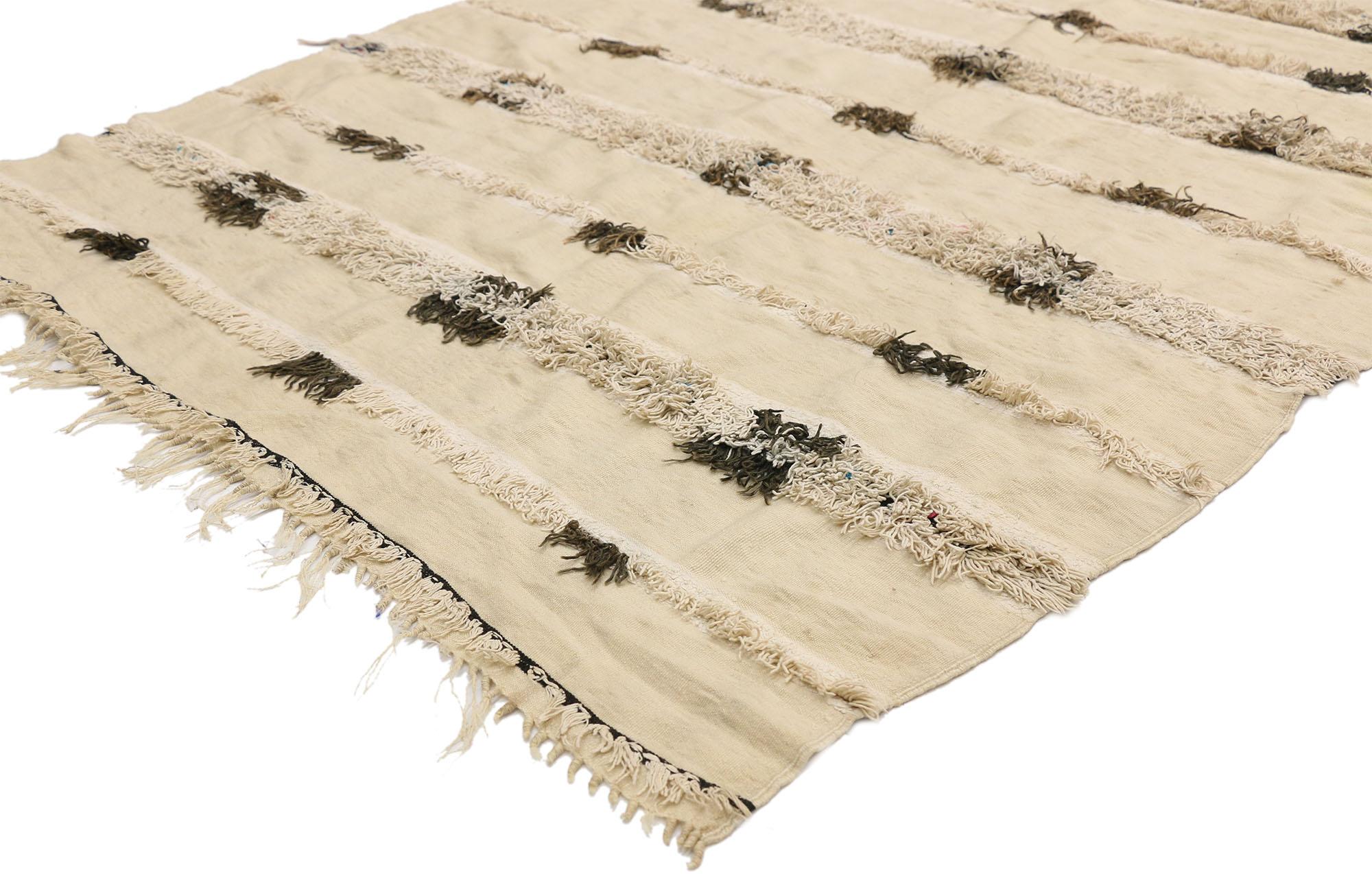 20823, vintage Moroccan wedding blanket, Berber Handira Tamizart. This handwoven wool vintage Moroccan Wedding Blanket also known as a Berber Handira features rows of fluffy fringe embellished with accent colors. The underside of this vintage