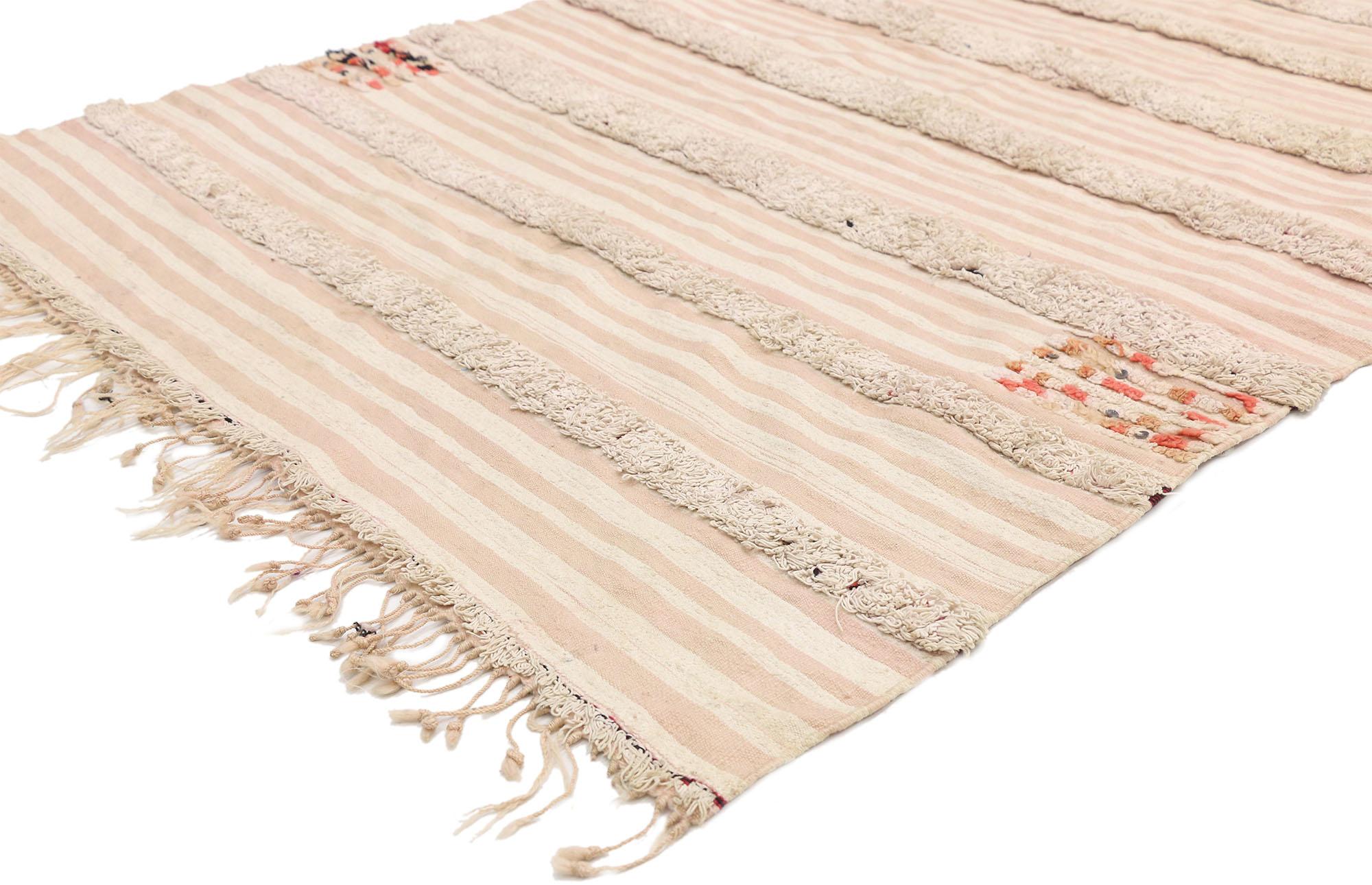 20822 Vintage Moroccan wedding blanket, Berber Handira Tamizart. This handwoven wool vintage Moroccan wedding blanket also known as a Berber Handira features rows of fluffy fringe embellished with accent colors and a hint of paillette sequins. The