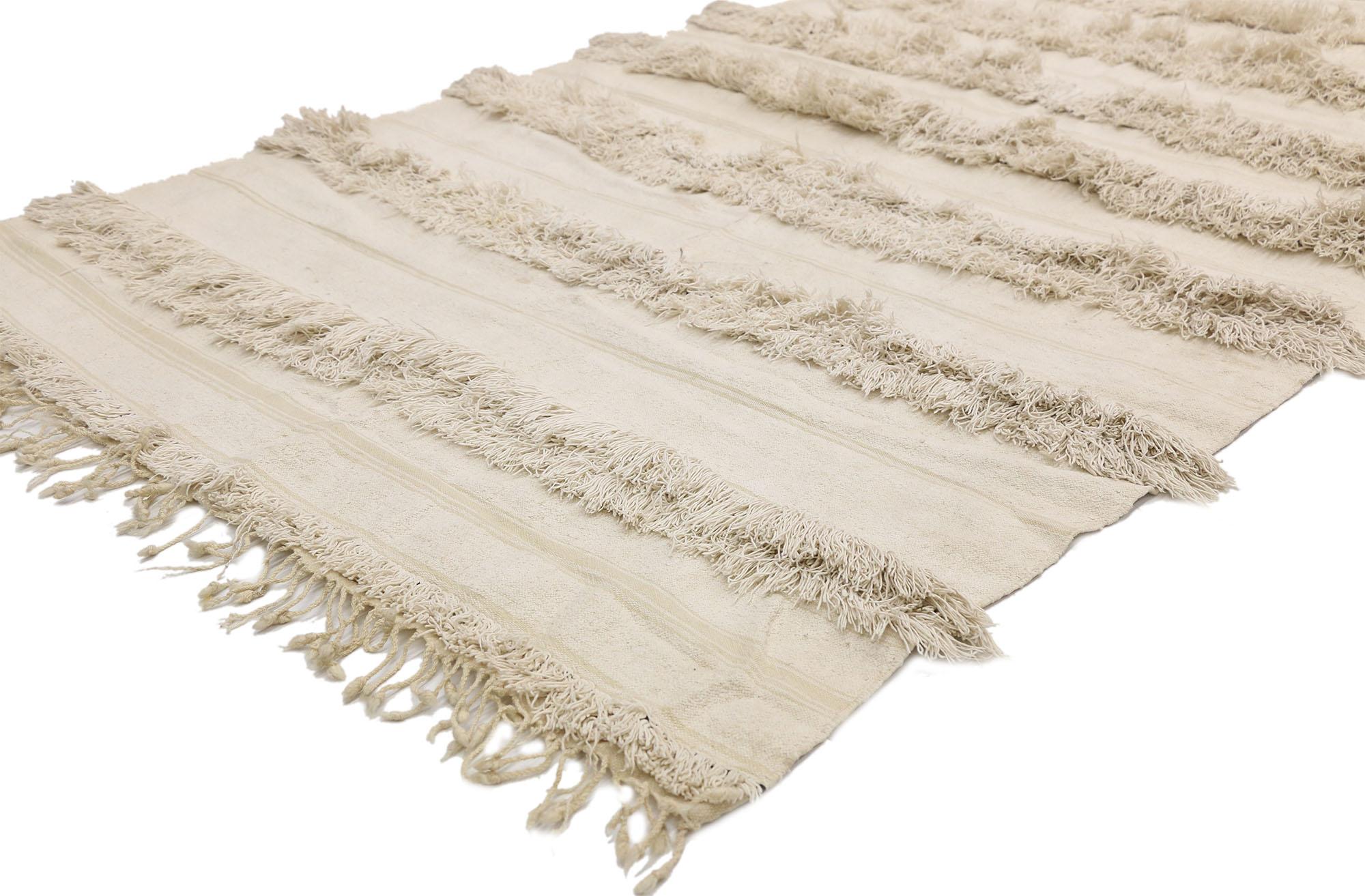20820, vintage Moroccan wedding blanket, Berber Handira Tamizart. This handwoven wool vintage Moroccan wedding blanket also known as a Berber Handira features rows of fluffy fringe. The underside of this vintage Handira blanket displays kilim bands