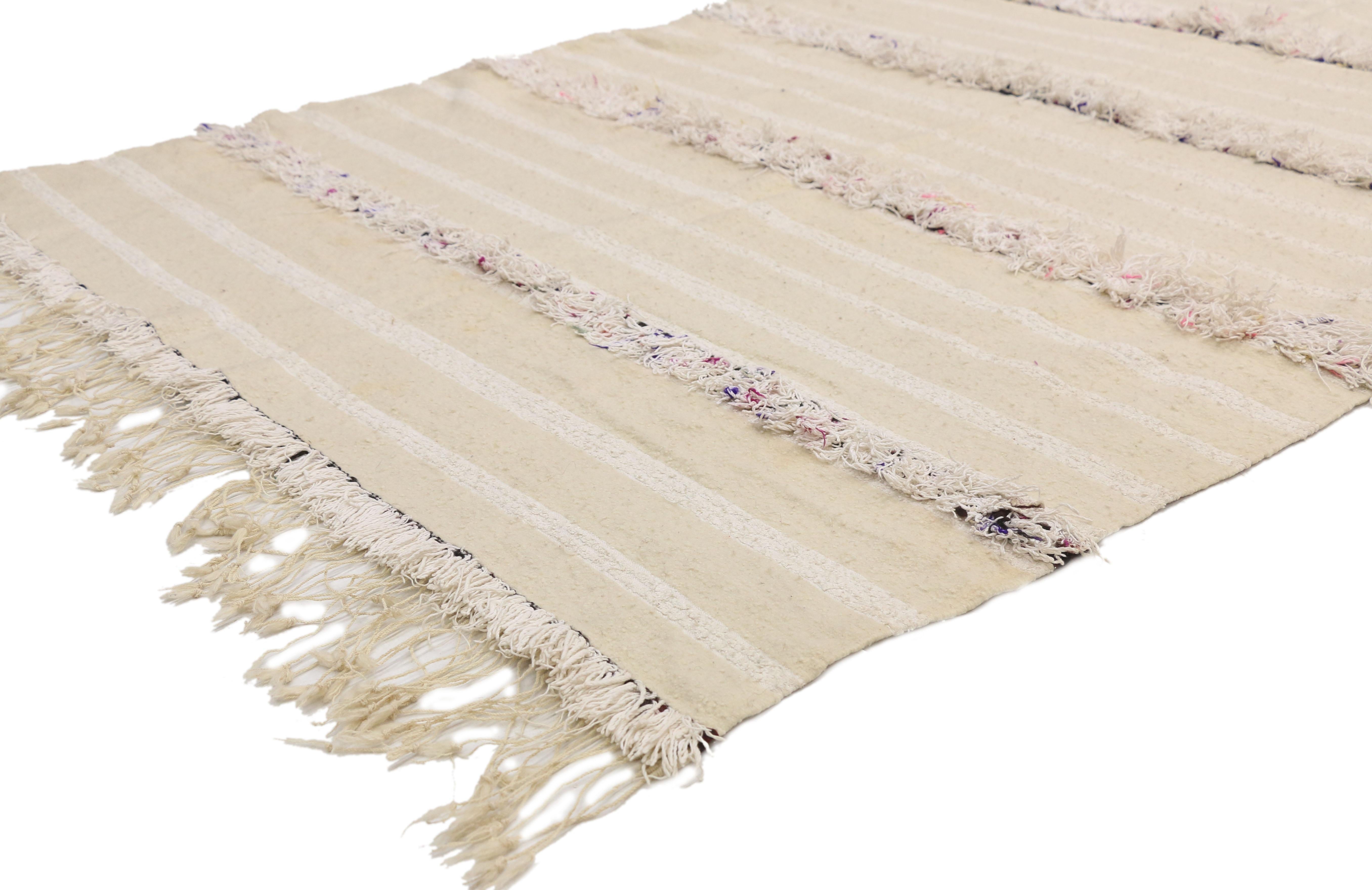 20825, vintage Moroccan wedding blanket, Berber Handira Tamizart. This handwoven wool vintage Moroccan wedding blanket also known as a Berber Handira features rows of fluffy fringe embellished with accent colors. The underside of this vintage
