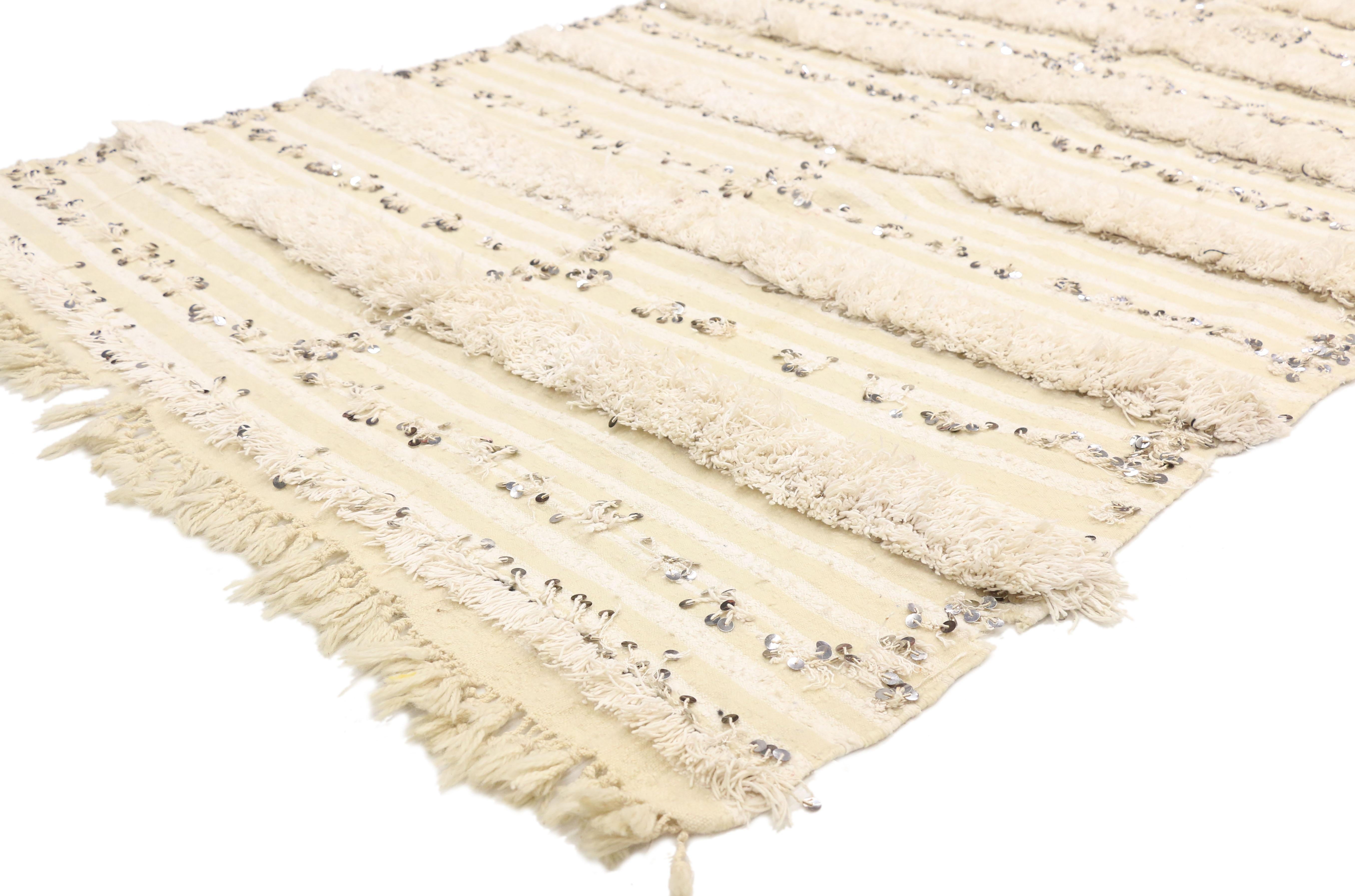 20830, vintage Moroccan wedding blanket, Berber Handira Tamizart. This handwoven wool vintage Moroccan Wedding Blanket also known as a Berber Handira features rows of fluffy fringe embellished with paillette sequins. The underside of this vintage