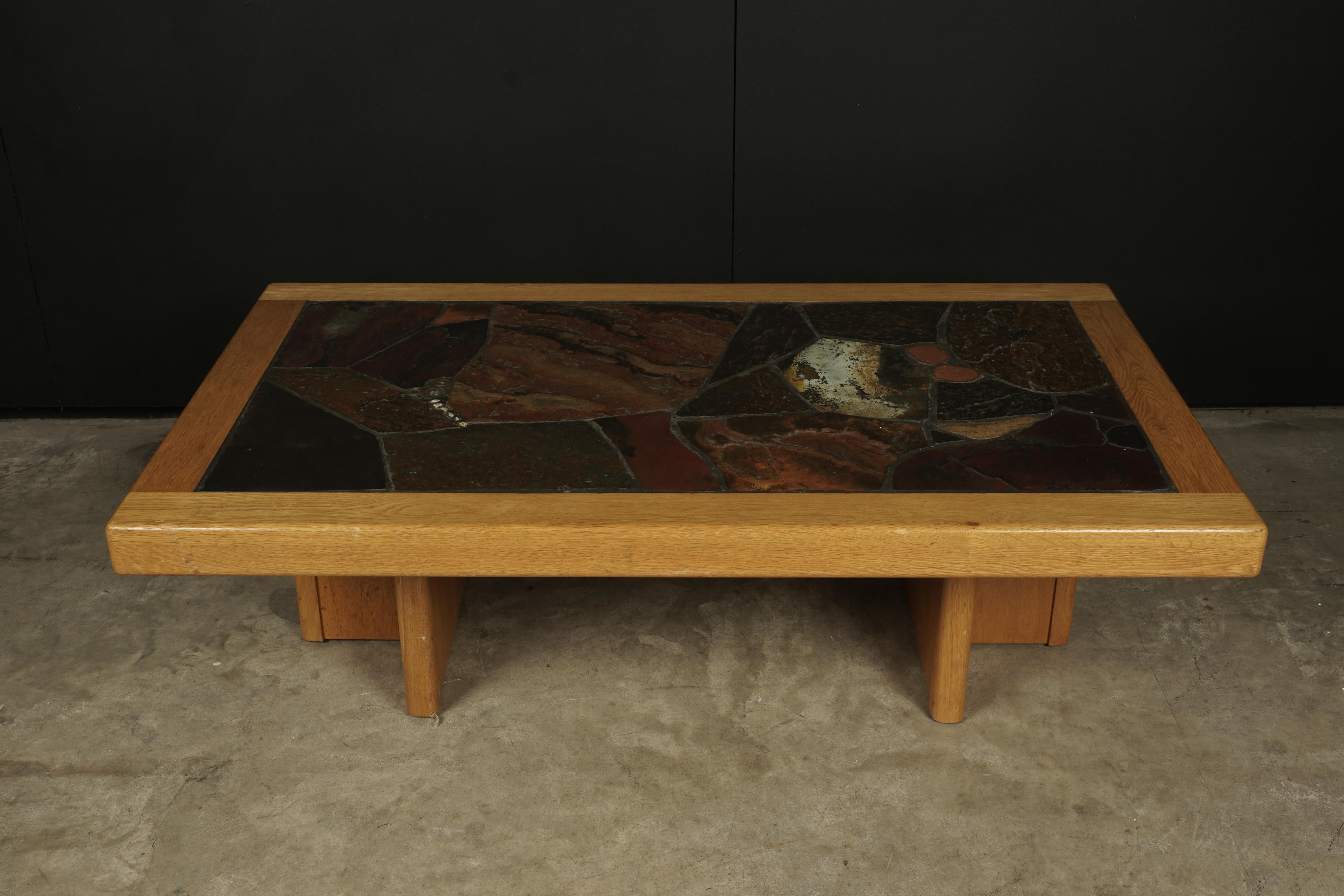 Vintage mosaic slate coffee table from France, circa 1960. Solid oak and slate construction. Light wear and patina.