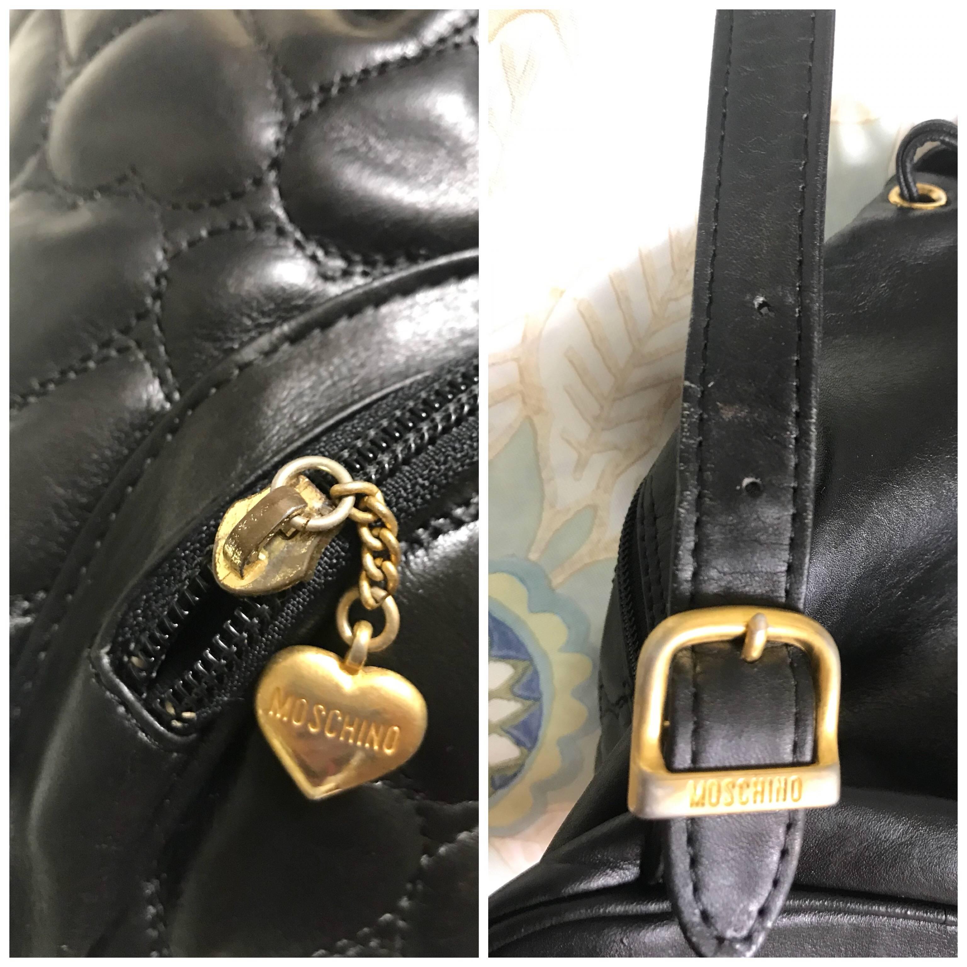 Vintage MOSCHINO black heart quilted leather backpack with golden heart motif. 3