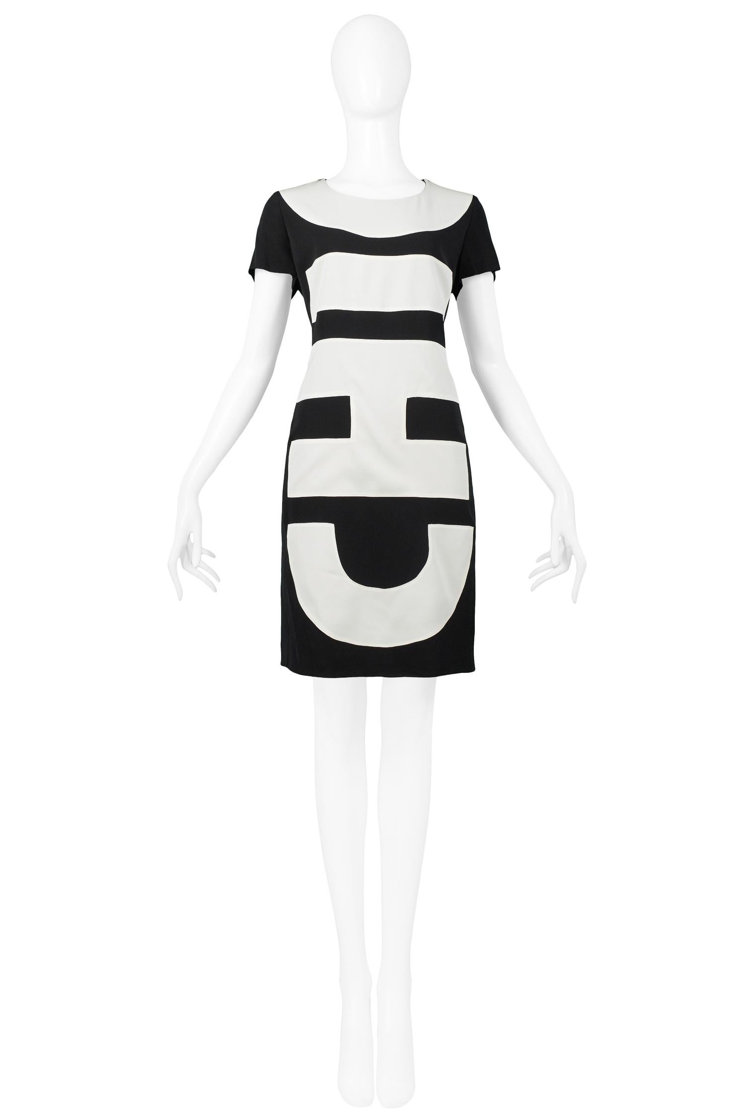 Resurrection Vintage is excited to offer a vintage Moschino dress that features white inset letters that read 