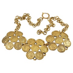 Collana vintage Moschino Cheap and Chic, economica e chic, con monete a grappolo