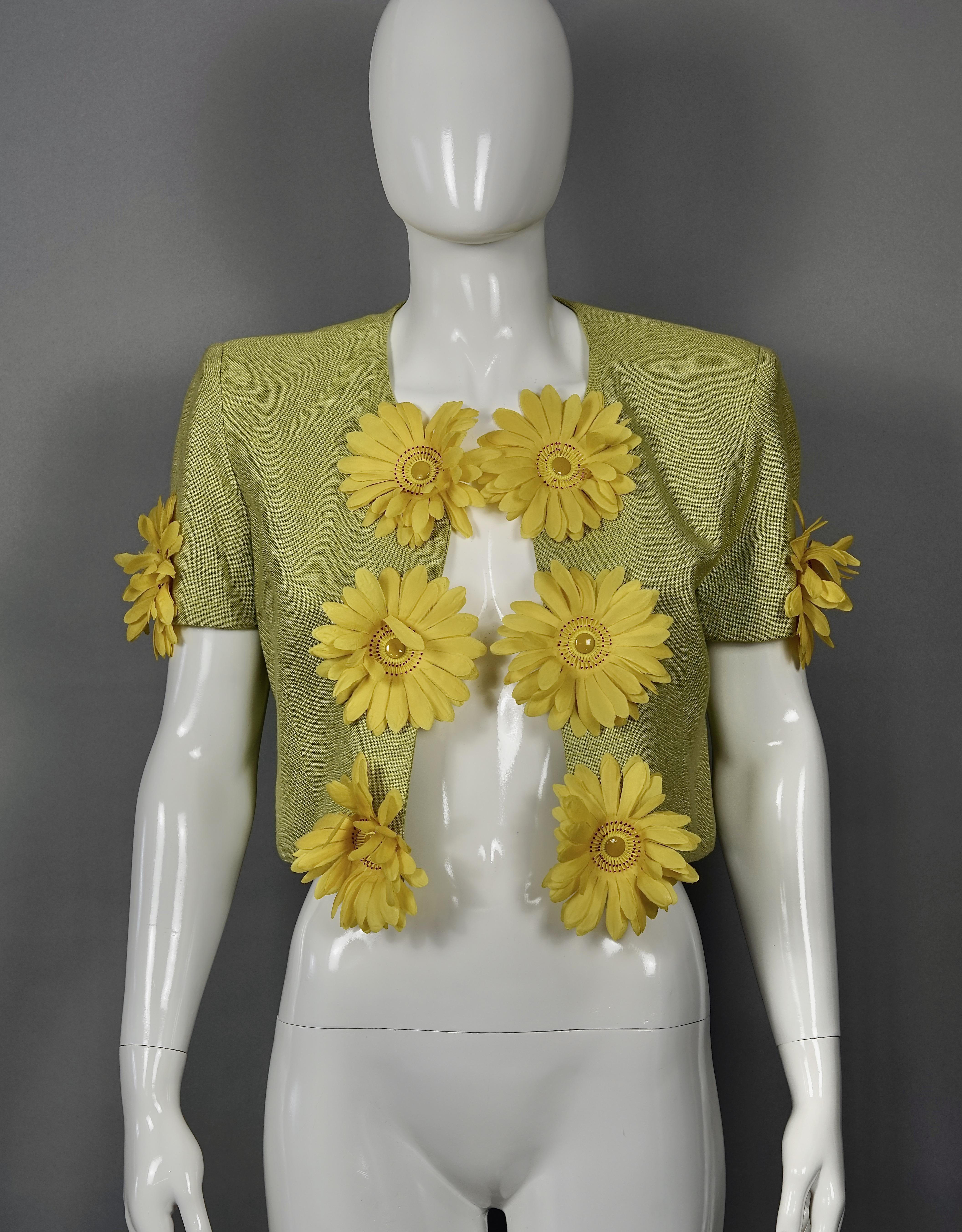 Vintage MOSCHINO CHEAP and CHIC Daisy Flower Novelty Cropped Jacket

Measurements taken laid flat, double bust and waist:
Shoulder: 16.14 inches (41 cm)
Sleeves: 8.26 inches (21 cm)
Bust: 18.50 inches (47 cm)
Waist: 16.14 inches (41 cm)
Length: