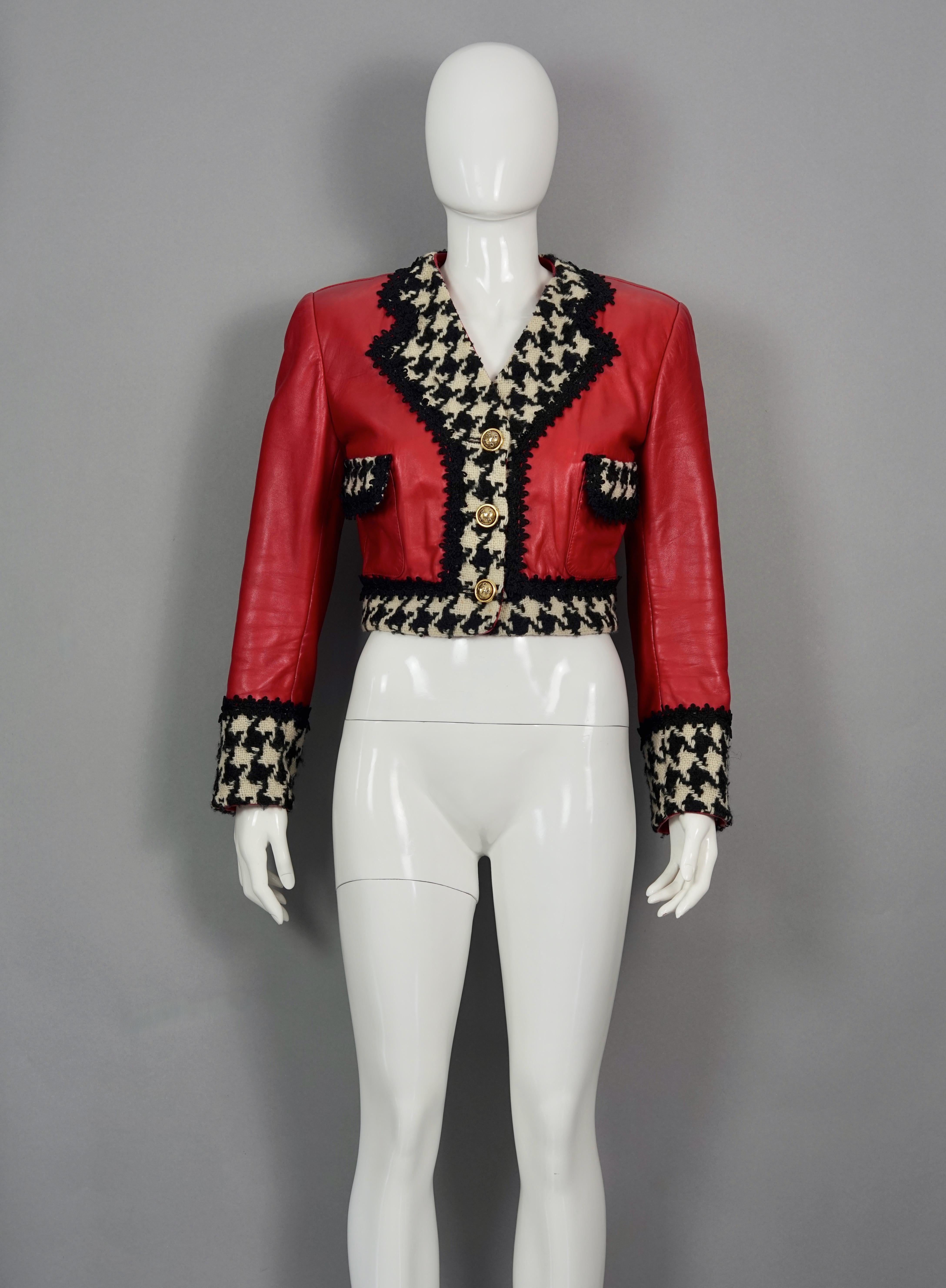 Vintage MOSCHINO CHEAP and CHIC Houndstooth Red Leather Cropped Jacket

Measurements taken laid flat, double bust and waist:
Shoulder: 16.53 inches (42 cm)
Sleeves: 22.83 inches (58 cm)
Bust: 19.68 inches (50 cm)
Waist: 14.56 inches (37 cm)
Length: