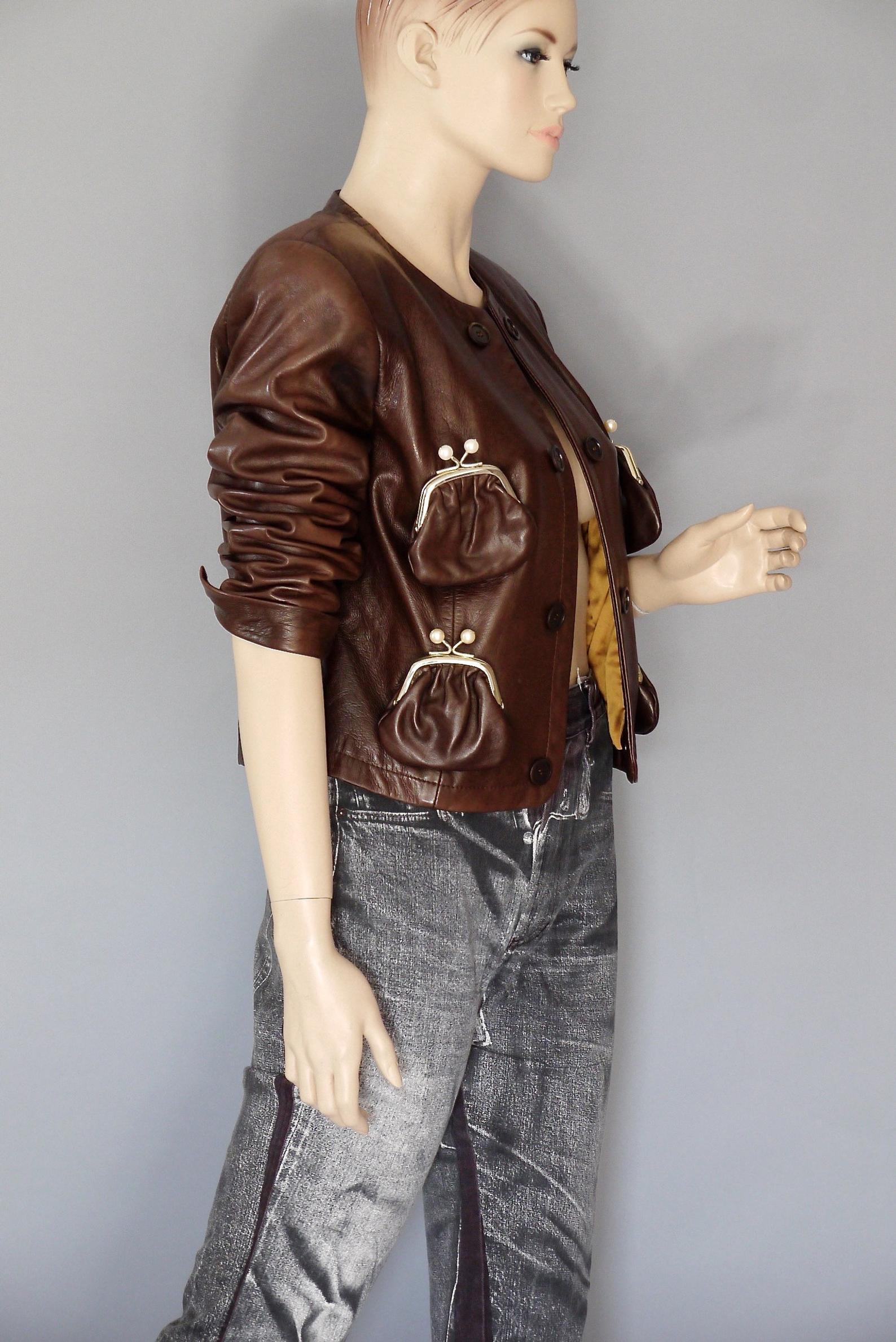 Vintage MOSCHINO Cheap and Chic Purse Kiss Lock Pocket Leather Jacket

Measurements taken laid flat, please double bust and waist:
Shoulder: 16.53 inches (42 cm)
Sleeves: 20.47 inches (52 cm)
Bust: 18.11 inches (46 cm)
Waist: 16.33 inches (41.5