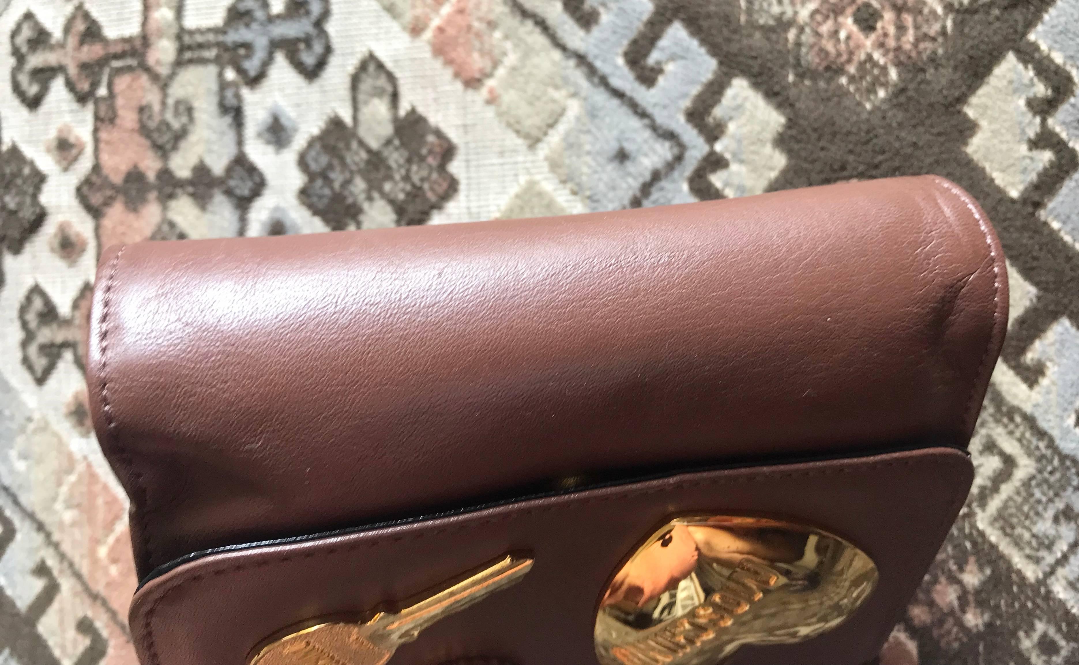 Women's Moschino Vintage chocolate brown leather golden heart motifs clutch pouch