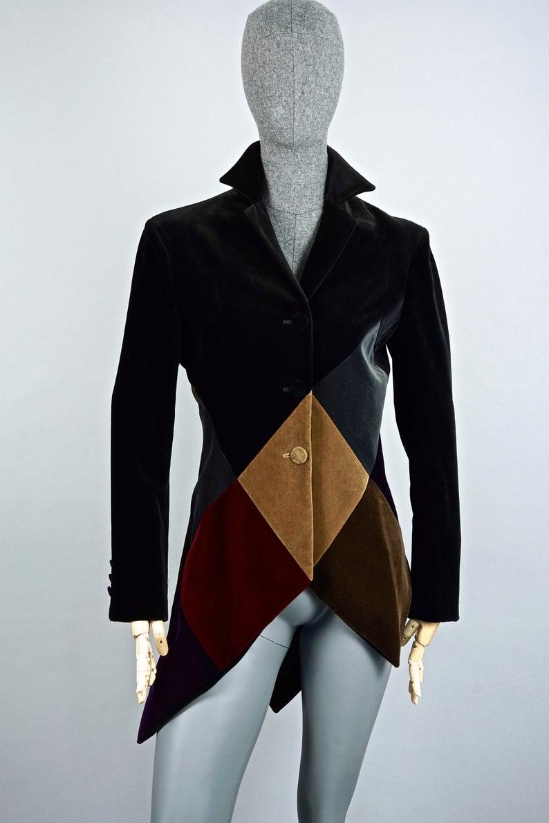 Vintage MOSCHINO COUTURE Harlequin Velvet Novelty Asymmetric Blazer Jacket

Measurements taken laid flat, please double bust and waist:
Shoulder: 17.32 inches (44 cm)
Sleeves: 23.42 inches (59.5 cm)
Bust: 18.70 inches (47.5 cm)
Waist: 15.35 inches