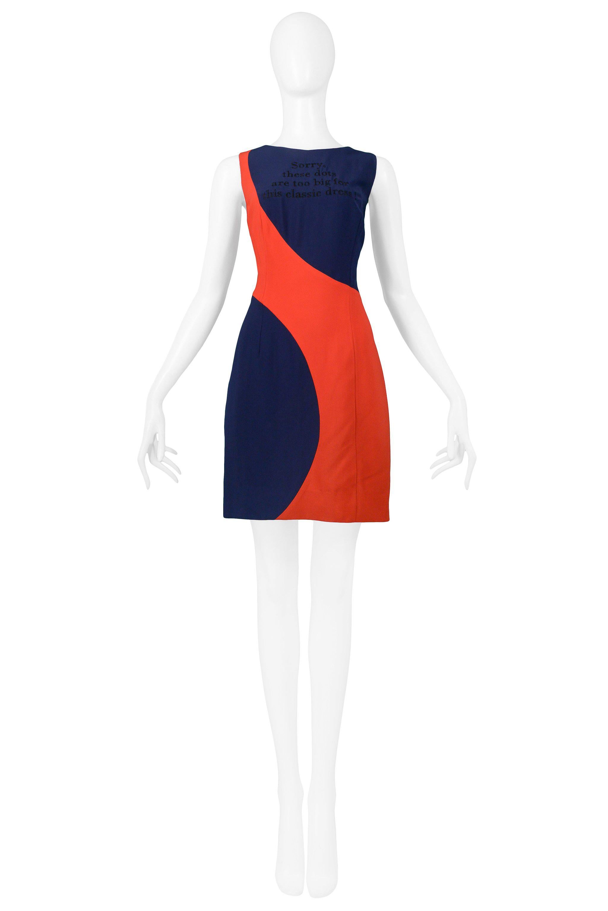 Resurrection Vintage is excited to offer a vintage navy and red Moschino Couture by Franco Moschino rayon blend shift mini dress: featuring navy and red insets, 