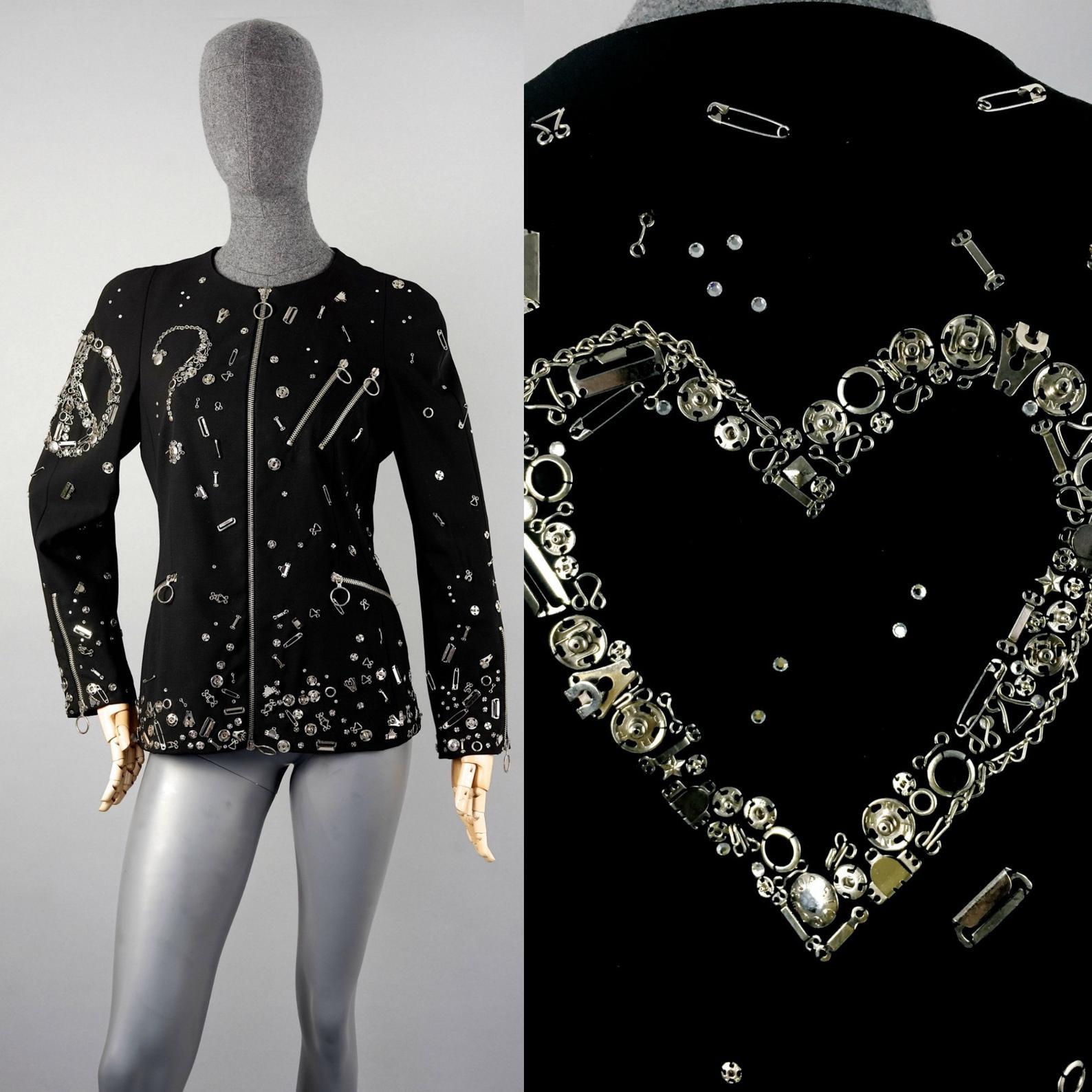 Vintage MOSCHINO COUTURE Peace Heart Question Mark Safety Pin Tailor Sewing Kit Blazer Jacket

Measurements taken laid flat, please double bust and waist:
Shoulder: 17.32 inches (44 cm)
Sleeves: 22.44 inches (57 cm)
Bust: 18.11 inches (46 cm)
Waist: