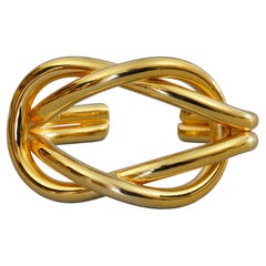 Vintage MOSCHINO Knotted Gold Tone Rigid Cuff Bracelet