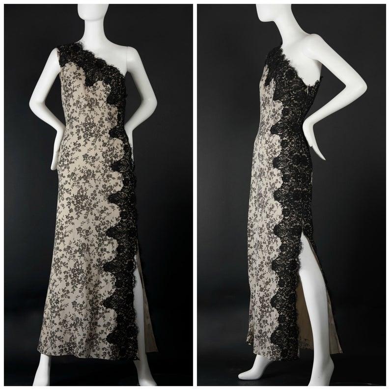 Vintage MOSCHINO Lace One Shoulder Evening Dress

Measurements taken laid flat:
Bust: 35 inches
Waist: 30 inches
Hips: 40 inches
Length: 57 inches
Slit: 21.5 inches

Features:
- 100% Authentic MOSCHINO Cheap and Chic.
- Nude long one shoulder dress