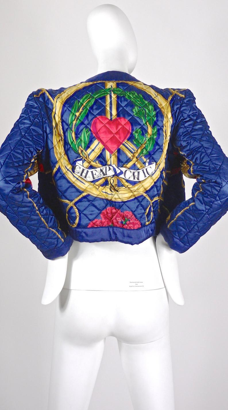 Vintage MOSCHINO Peace and Love Nautical Print Quilted Jacket

Measurements taken laid flat, please double bust, waist and hips:
Shoulder: 17 inches
Sleeves: 23 inches
Bust: 18 inches
Waist: 17 inches
Length: 18 4/8 inches

Features:
- 100%