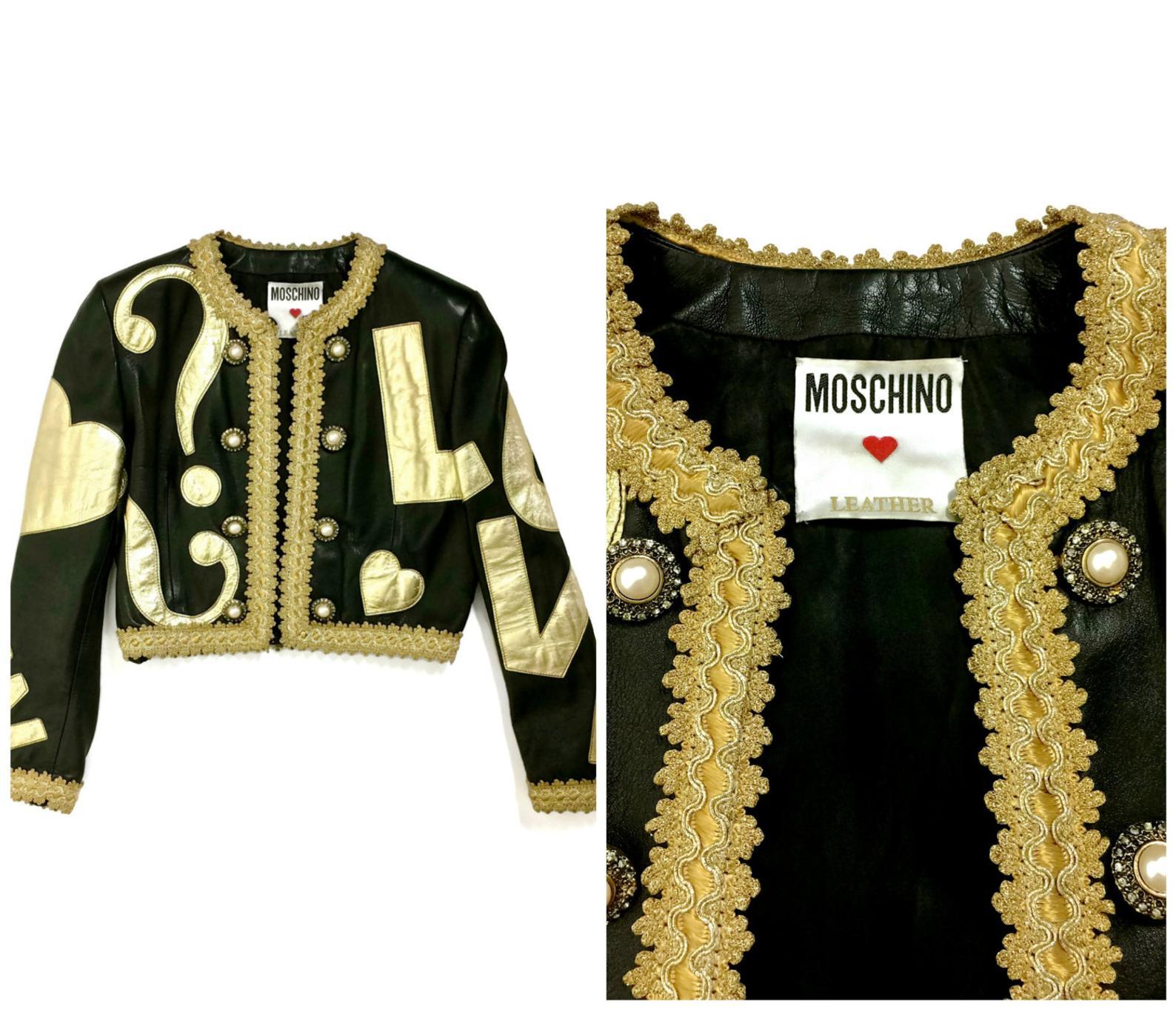 Vintage MOSCHINO PEACE and LOVE Passementerie Metallic Trim Black Gold Leather Jacket

Measurements taken laid flat, please double bust and waist:
Shoulder: 16 4/8 inches (41.91 cm)
Sleeves: 23 4/8 inches (59.69 cm)
Bust: 19 inches (48.26 cm) open