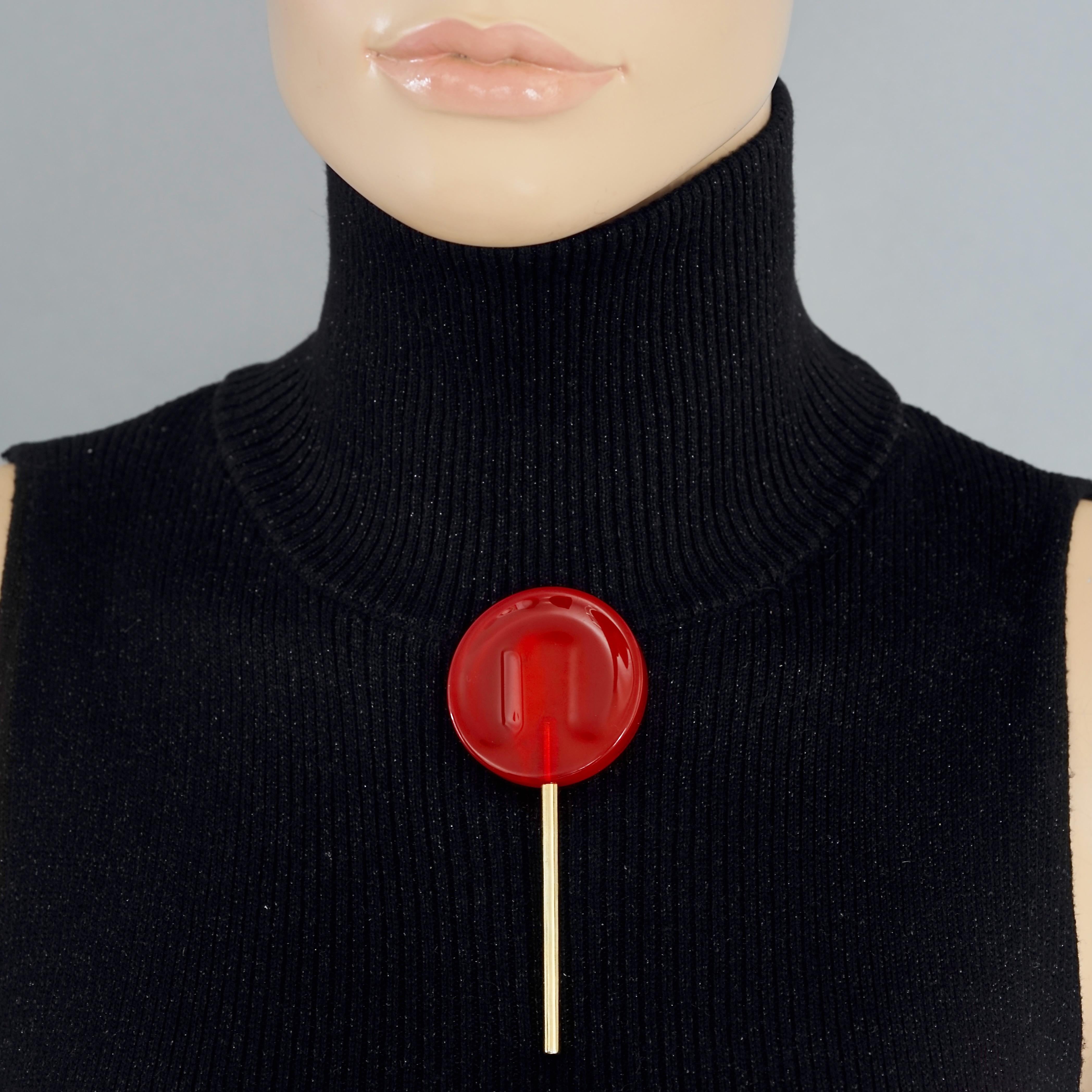 Vintage MOSCHINO Red Cherry Lollipop Candy Novelty Brooch

Measurements: 
Height: 4.13 inches (10.5 cm)
Diameter: 1.77 inches (4.5 cm)

Features:
- 100% Authentic MOSCHINO.
- Red cherry lollipop candy resin novelty brooch.
- Engraved MOSCHINO CHEAP