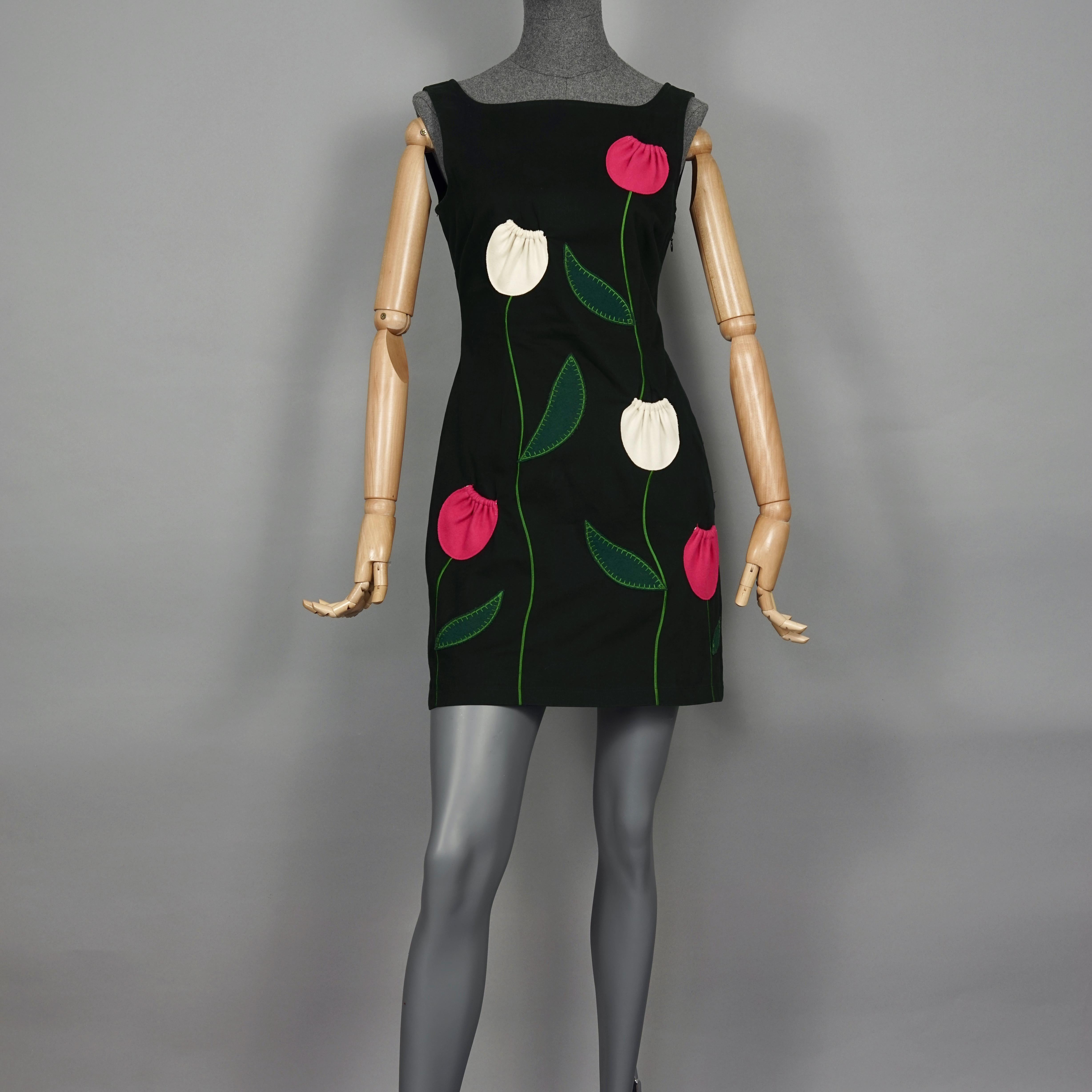 Vintage MOSCHINO Tulip Flower Pockets Novelty Dress

Measurements taken laid flat, please double bust and waist:
Shoulder: 14.96 inches (38 cm)
Bust: 17.32 inches (44 cm)
Waist: 13.78 inches (35 cm)
Hips: 17.71 inches (45 cm)
Length: 33 inches (84
