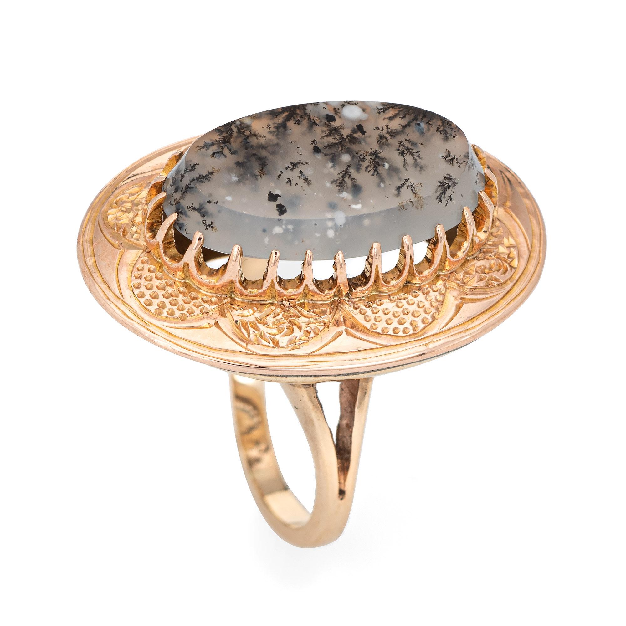 Stylish vintage moss agate cocktail ring (circa 1950s to 1960s) crafted in 10 karat rose gold. 

Moss agate measures 18mm x 10mm. The agate is in excellent condition and free of cracks or chips. 

Moss agate is like looking into a small forest with
