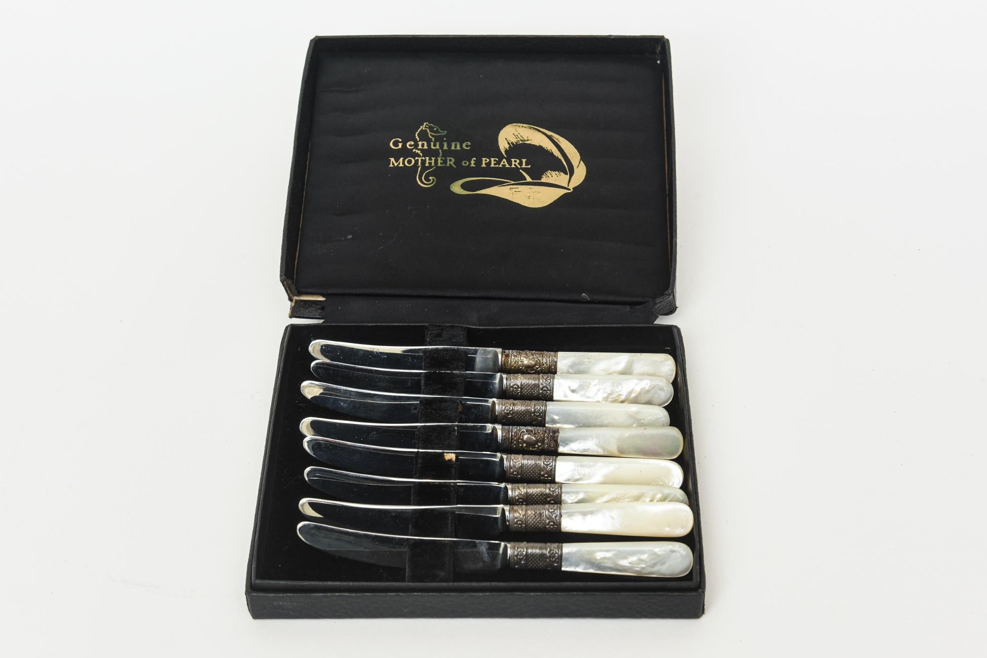 This vintage set of 8 Mother-of Pearl, stainless steel and metal appetizer or cheese forks are in their original square black box. These may have never been used. It says on the inside genuine Mother-Of Pearl Says on the knife Morhill NY Made in