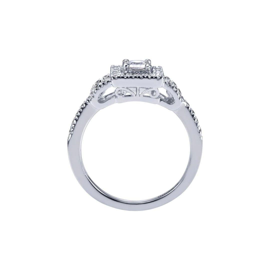 Vintage Motif Princess Cut Diamond Engagement Ring in 14k White Gold.﻿ This unique diamond engagement ring by New York bridal designer Gabriel Co features vintage inspired design with clean, elegant lines. Center natural princess cut diamond weighs