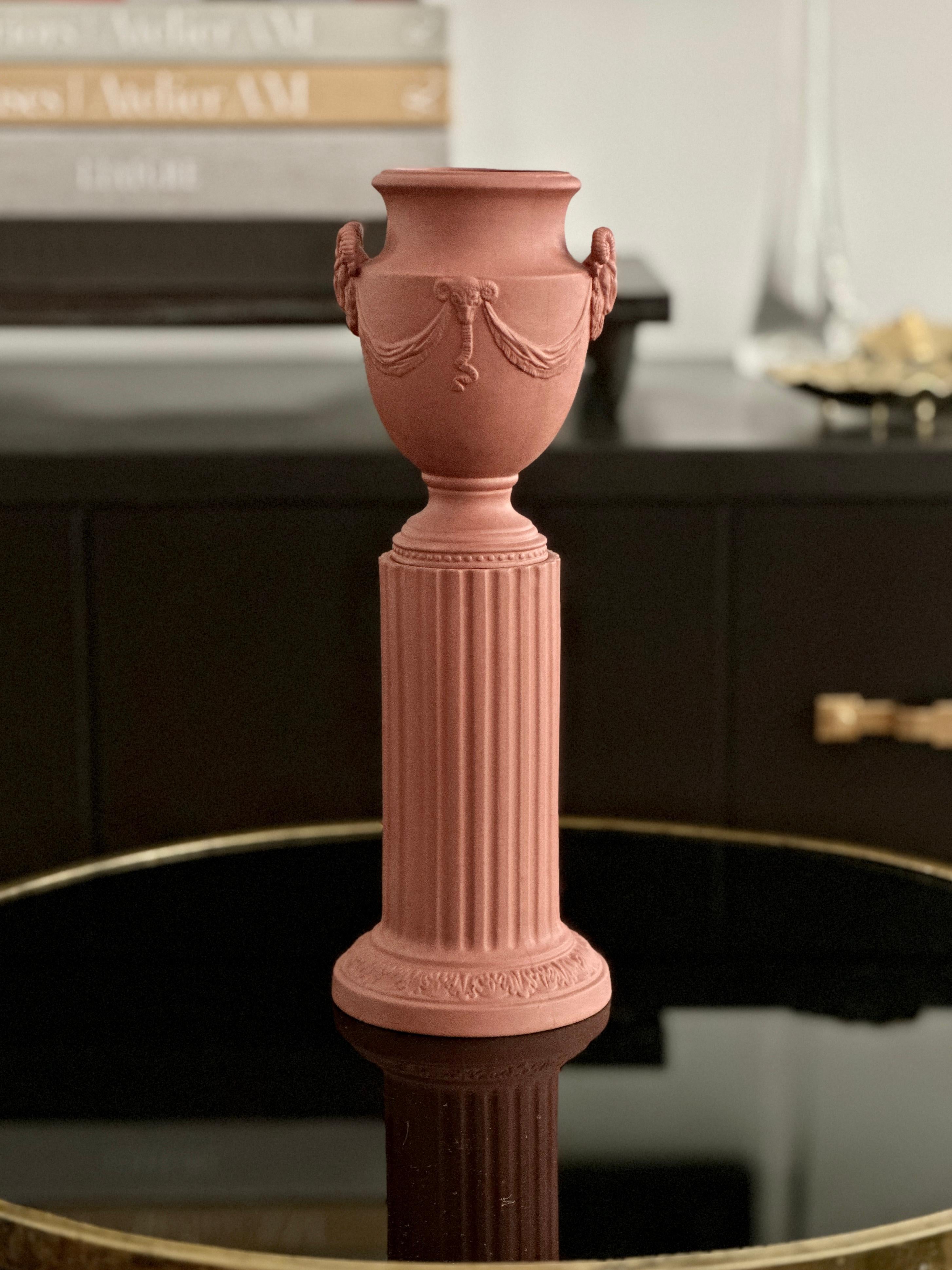 Vintage diminutive terracotta pedestal and urn from Mottahedeh. The urn and pedestal is approximately 11 3/4 inches tall, the urn is 5 3/4 inches tall and the pedestal is 6 inches tall, at its widest is 4 inches. Under the base is a Mottahedeh stamp
