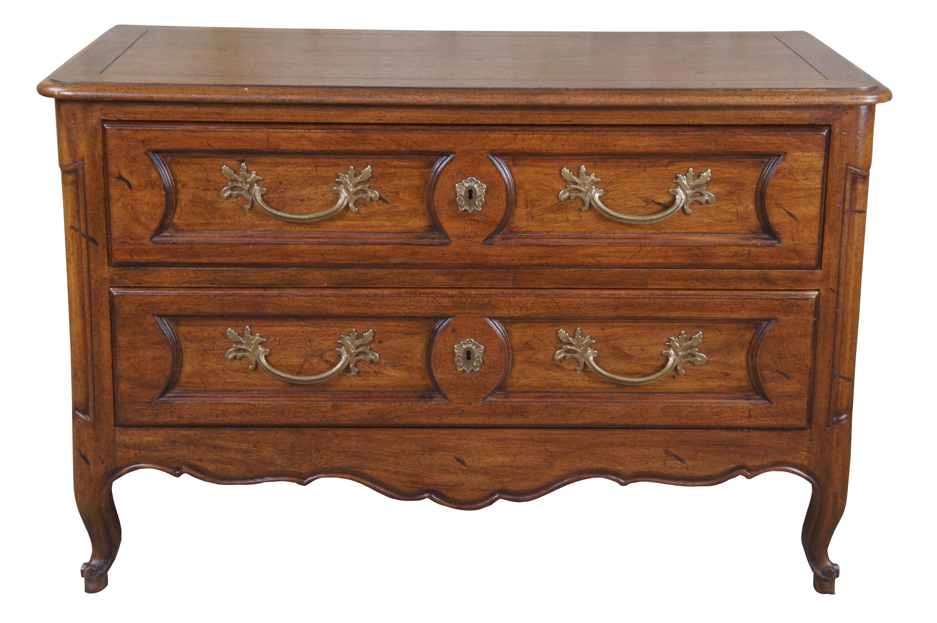 Vintage Mt. Airy walnut French Provincial / Country lowboy chest, dresser or stand featuring rectangular serpentine form with two drawers, brass hardware and cabriole legs. 2483. 

Mount Airy of North Carolina's roots go back to 1888 when the