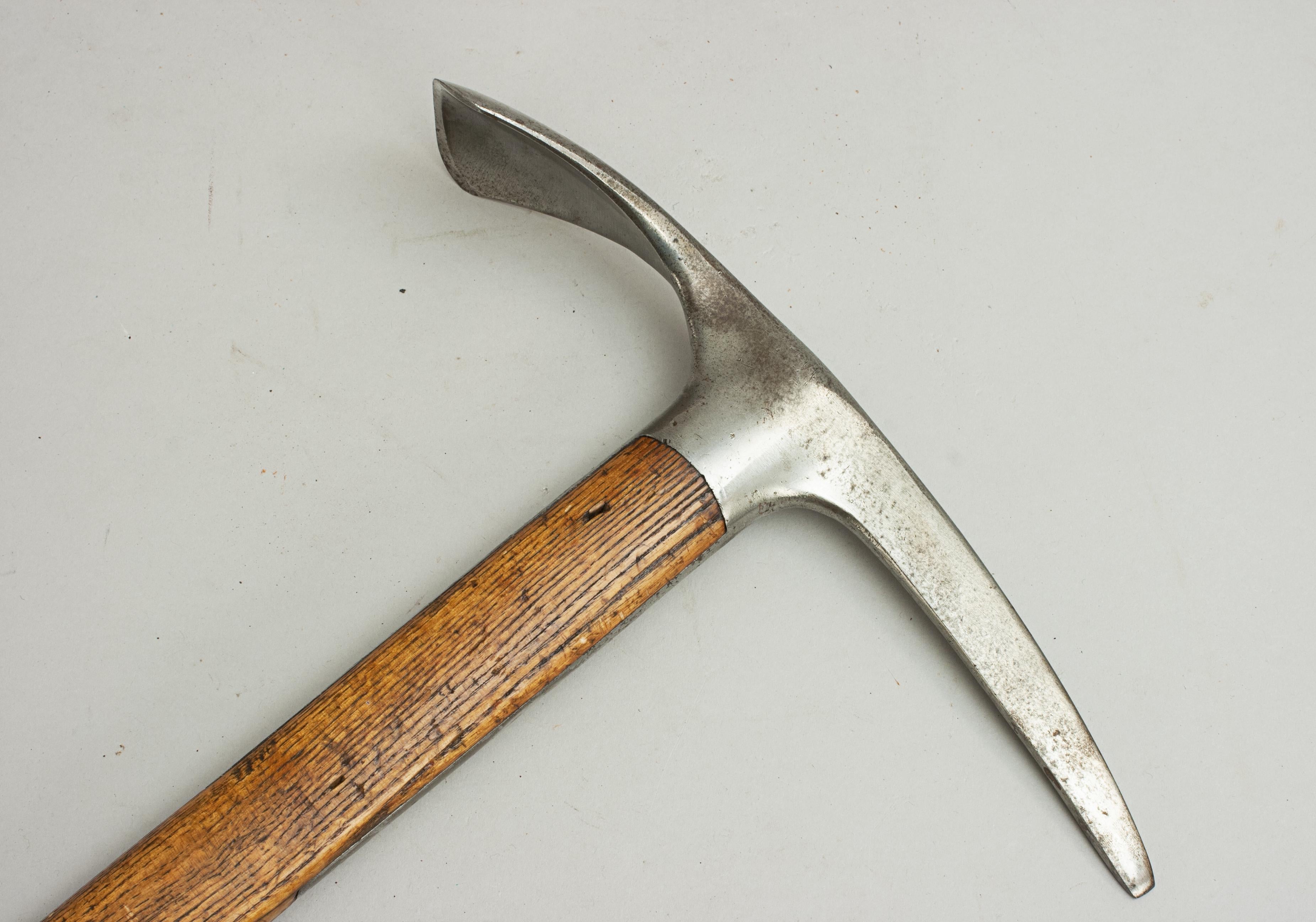 Vintage Ice Axe, Stubai.
A good Austrian 'Stubai' ice axe, the handle is made from ash with a good steel pick and with a good adze. This is a fine quality ice pick with the head stamped with the diamond 'STUBAI' logo.

Ice axes are multipurpose