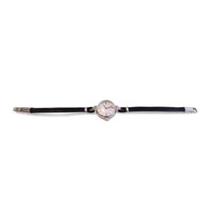 Vintage Movado 14 Karat White Gold and Diamond Whit Black Strap