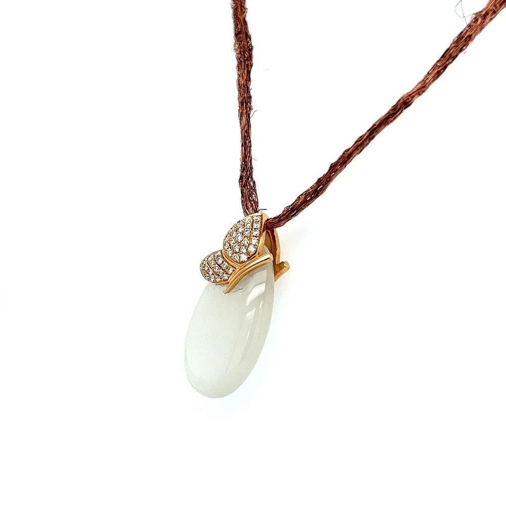 Simply Beautiful! Vintage MOVADO Designer Diamond Butterfly on Moonstone Gold Drop Necklace. Diamonds, weighing approx. 0.018tcw. Hand crafted in 18K Rose Gold. Suspended from a 19” Satin Cord. More Beautiful in real time! Sure to be admired…A piece