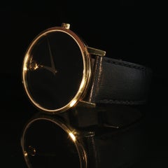 Reloj Movado vintage de colección, con esfera negra clásica y acabado dorado, de cuarzo suizo, 40 mm