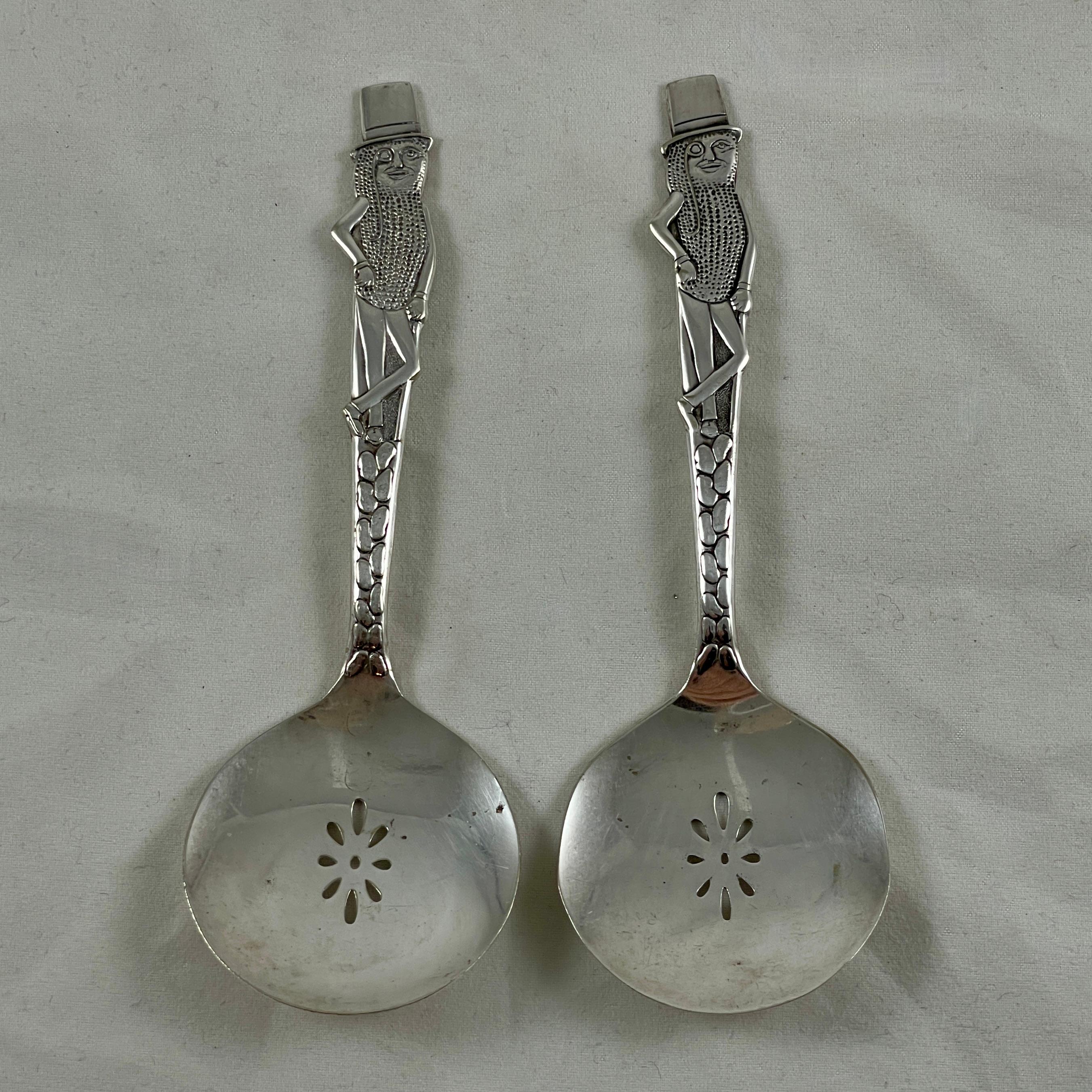 A pair of Mr. Peanut nut spoons, made by Carlton Silver Plate in 1941.

The spoon is detailed on both the front and back.

Mr. Peanut is the advertising logo and mascot of Planters, an American snack-food company. He is depicted as an