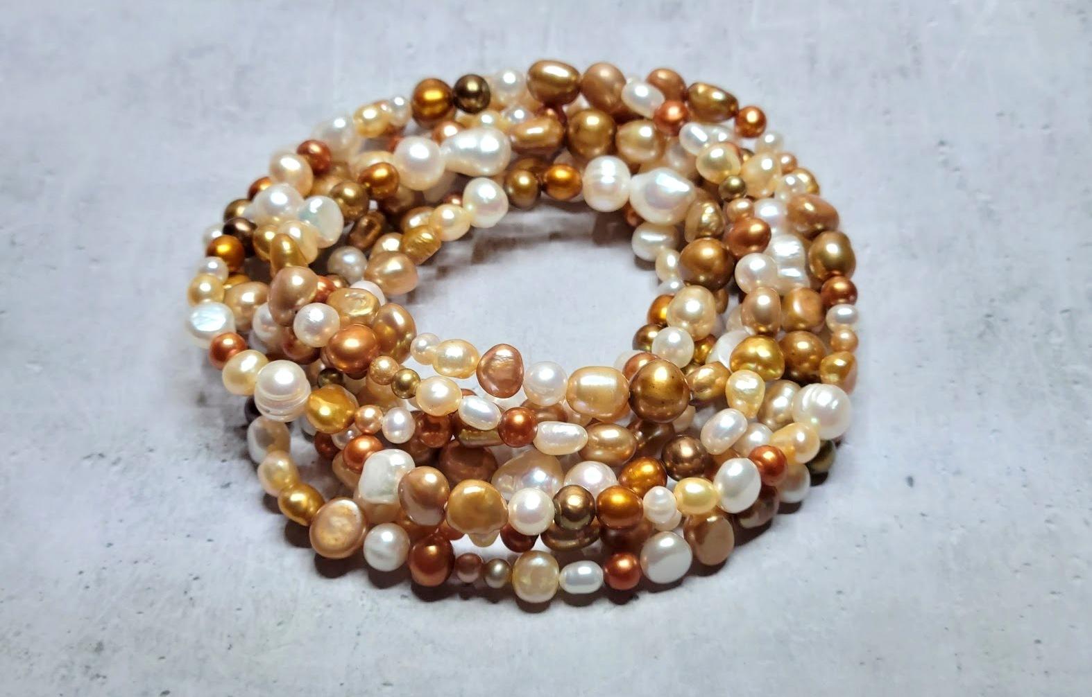 An amazing expression of modern chic and charm inspired by the birth of real pearls, this statement-long pearl necklace creates a playful, bright, and flirty look. Unlike the traditional round, the irregular shape adorns your image with a more