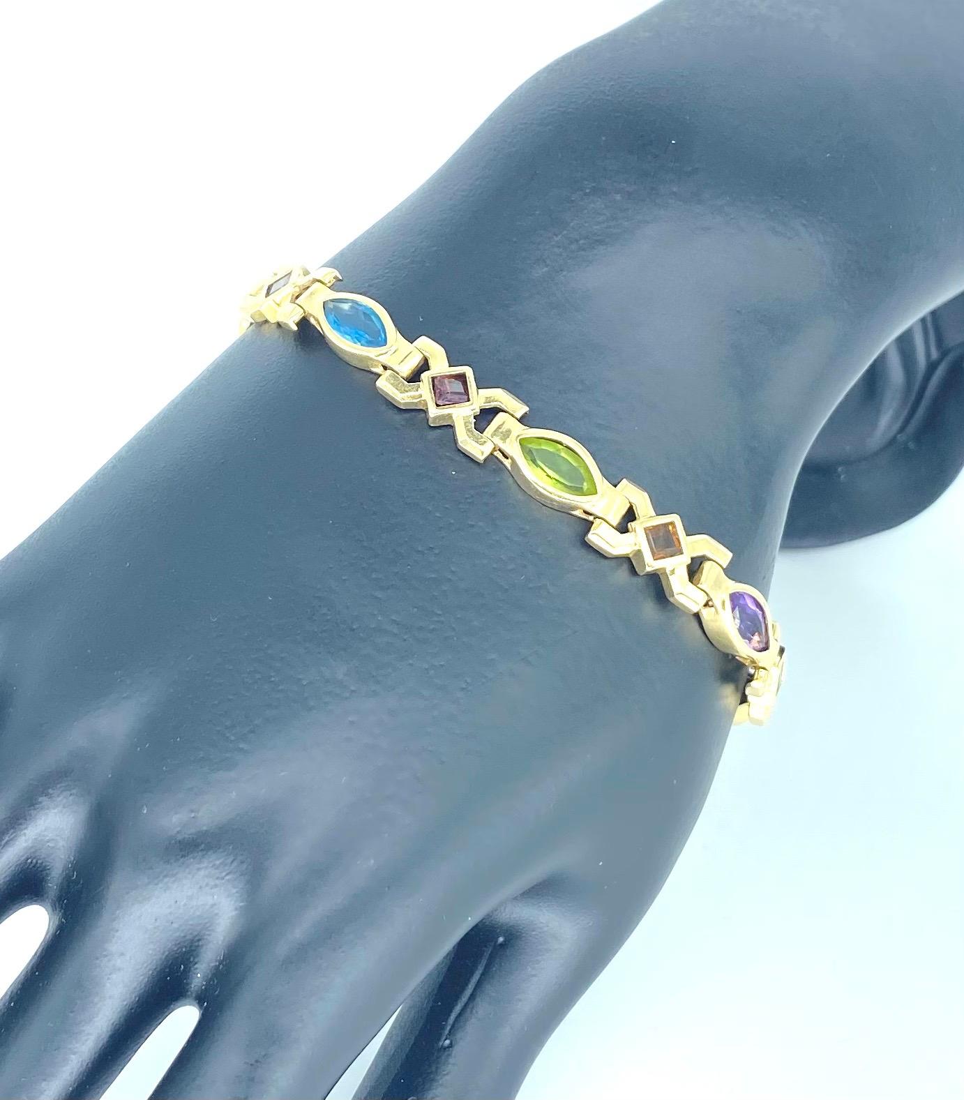 Bracelet vintage en or 14 carats avec pierres précieuses multicolores de formes mélangées Unisexe en vente