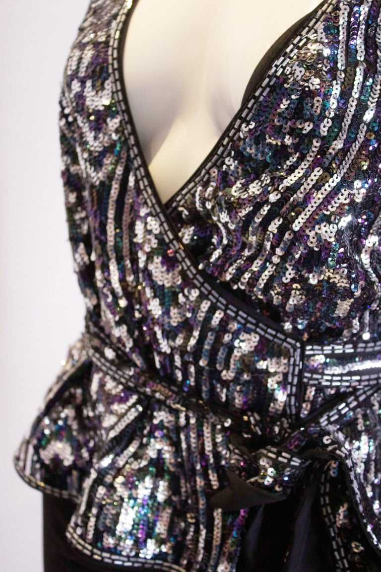 SEQUINED TEAL WRAP JACKET