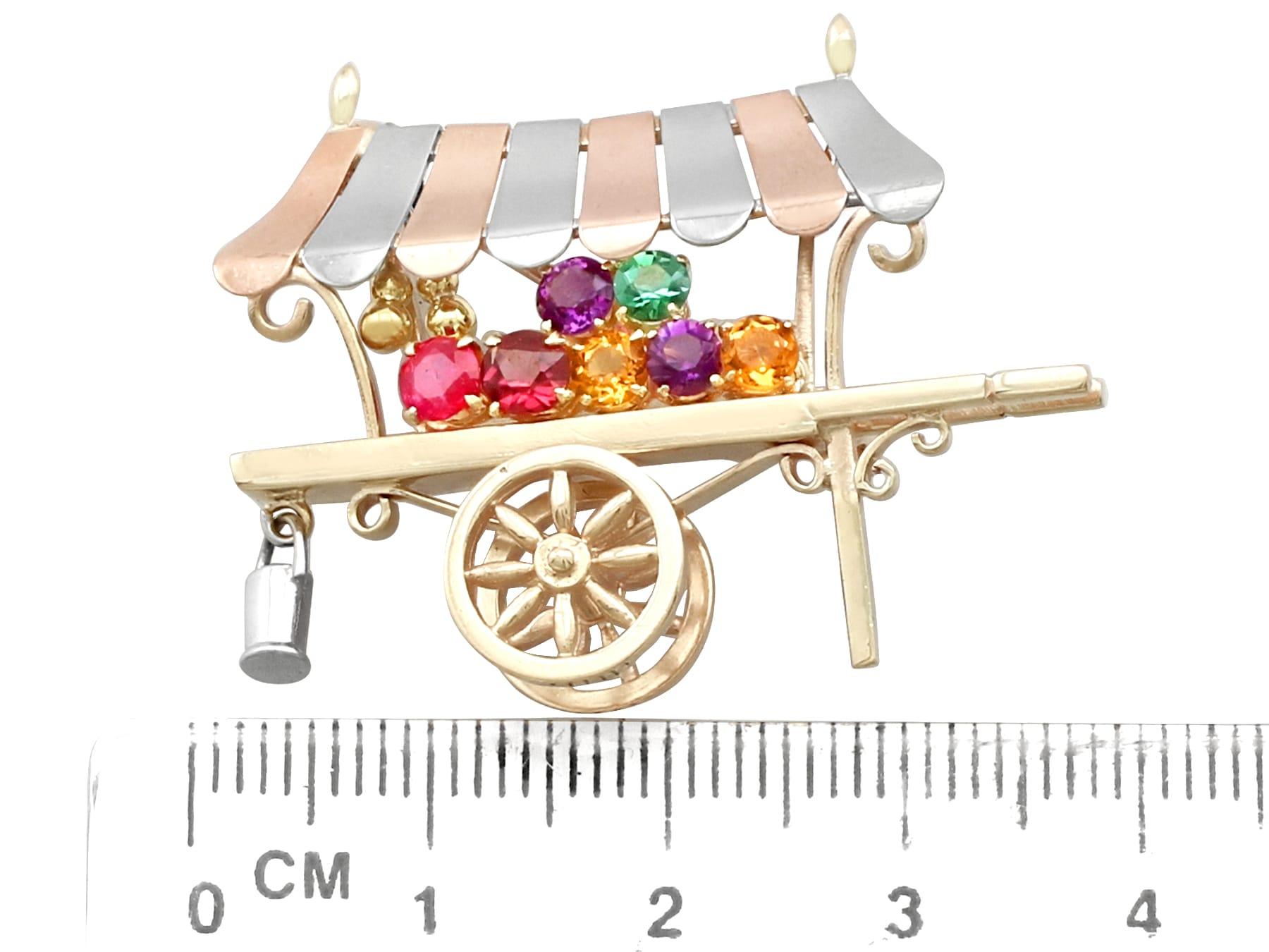 Vintage Multi-Gemstone and Yellow Gold 'Cart' Brooch by Alabaster and Wilson In Excellent Condition For Sale In Jesmond, Newcastle Upon Tyne