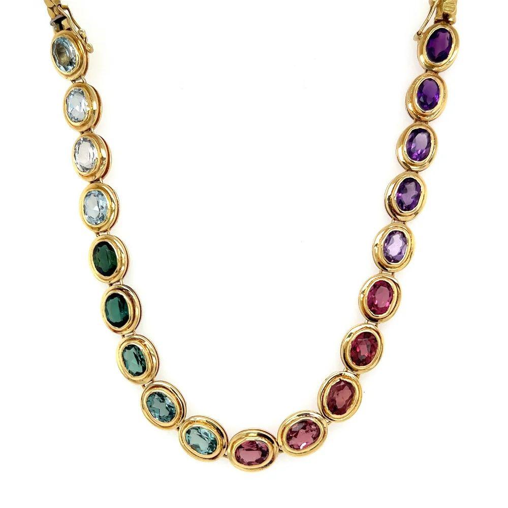 Simply Beautiful! Finely detailed Multi Gemstone Gold Necklace. Hand set with a Rainbow of Gemstones. Hand crafted in 18K Yellow Gold. Approx. length of necklace: 16