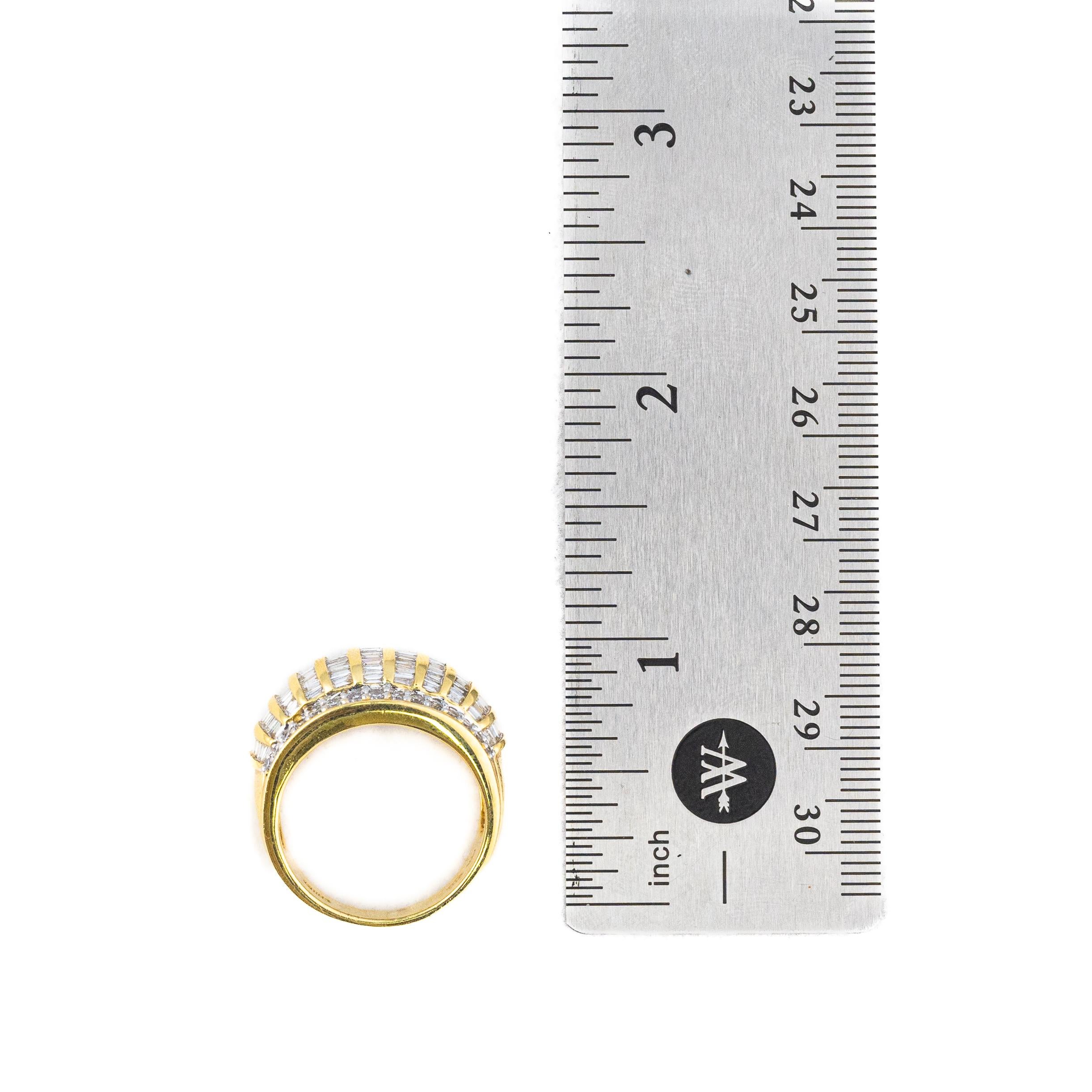 Vintage Multi Row Diamond Gold Dome Ring

A striking vintage dome ring that captures the essence of timeless glamour, this magnificent piece is crafted in radiant yellow gold and adorned with a mesmerizing array of diamonds. Featuring a bold