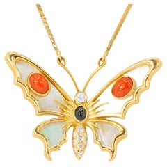 Ciondolo d'epoca con farfalla a più pietre in oro 18k e collana in oro giallo 14k
