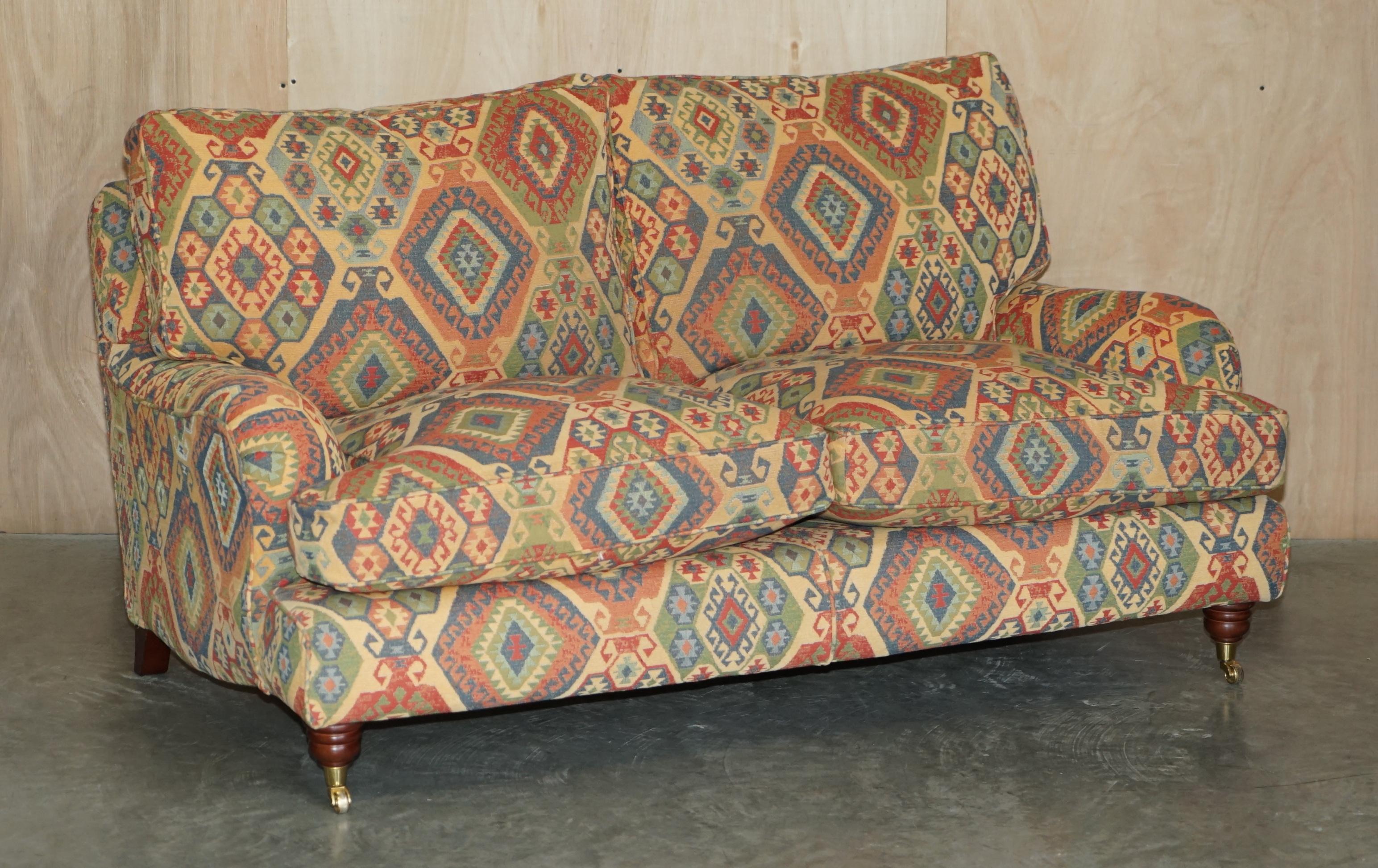 We are delighted to offer for sale this stunning original MultiYork 2-3 seat sofa with matching armchair upholstered in Kilim Fabric.

A stunning suite by the great British firm that was MultiYork, the fabric has a Kilim pattern and is very