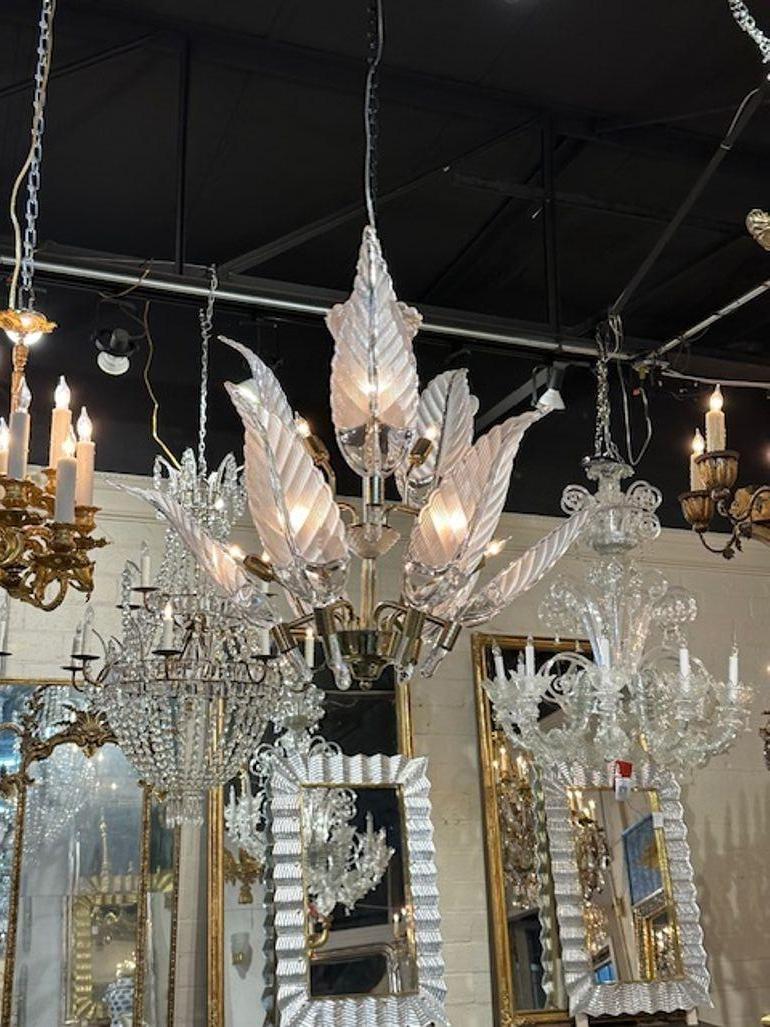 Vintage Murano glass and brass 2-tier leaf chandelier. Circa 1980. The chandelier has been professionally rewired, comes with matching chain and canopy. It is ready to hang!